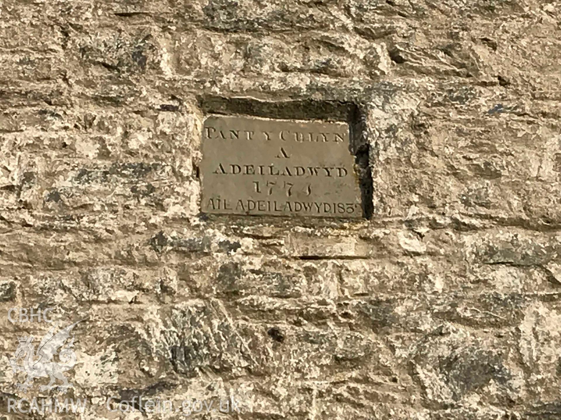 Detailed view of plaque on the exterior of Seion Welsh Baptist chapel, Pantycelyn, Treflys. Colour photograph taken by Paul R. Davis on 17th November 2018. Transcript: PANT Y CELYN A ADEILADWYD 1774 AIL ADEILADWYD 1832