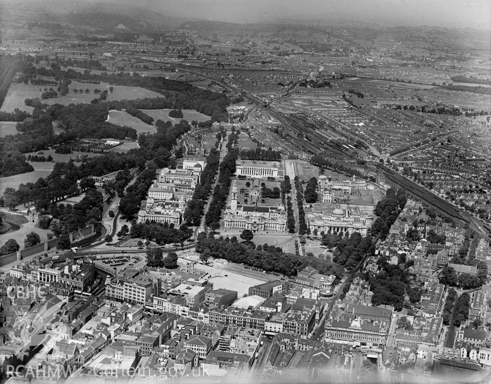 View of Cathays Park, Cardiff showing civic centre and war memorial, oblique aerial view. 5?x4? black and white glass plate negative.