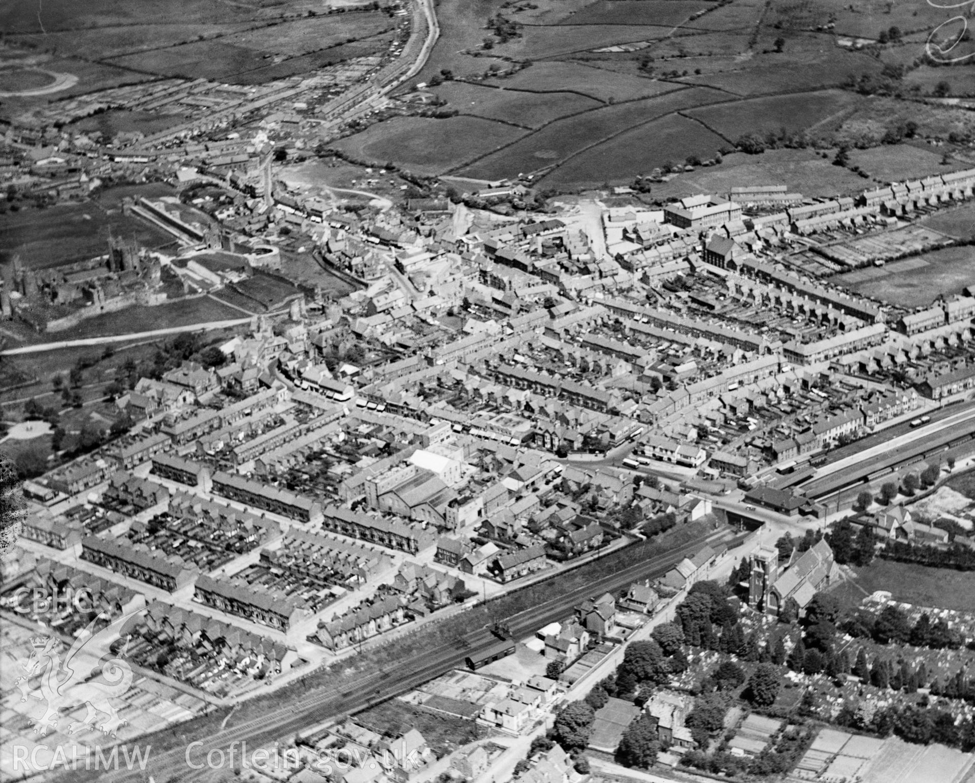 General view of Caerphilly, oblique aerial view. 5?x4? black and white glass plate negative.