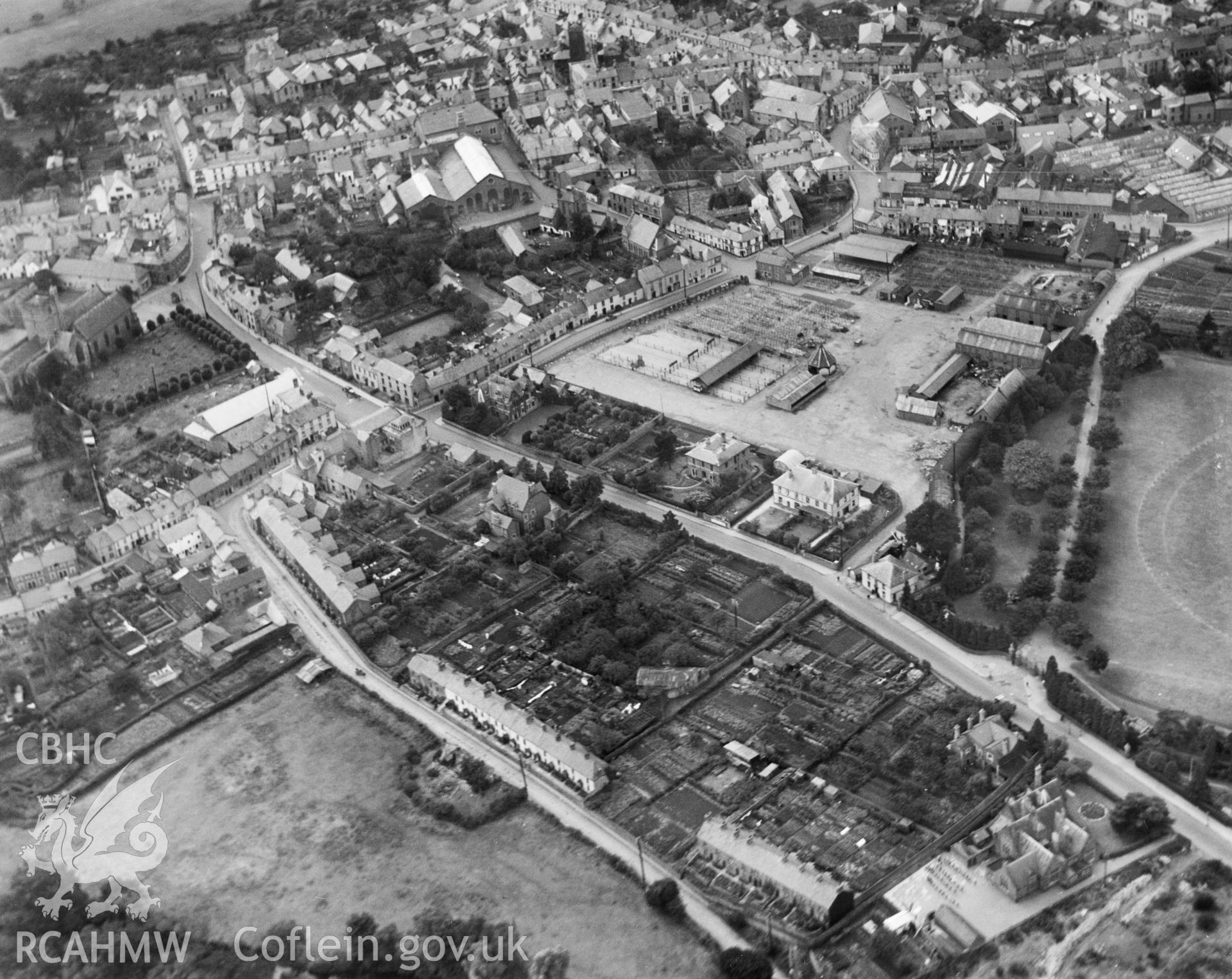 View of Abergavenny showing cattle market and Bailey Park, oblique aerial view. 5?x4? black and white glass plate negative.