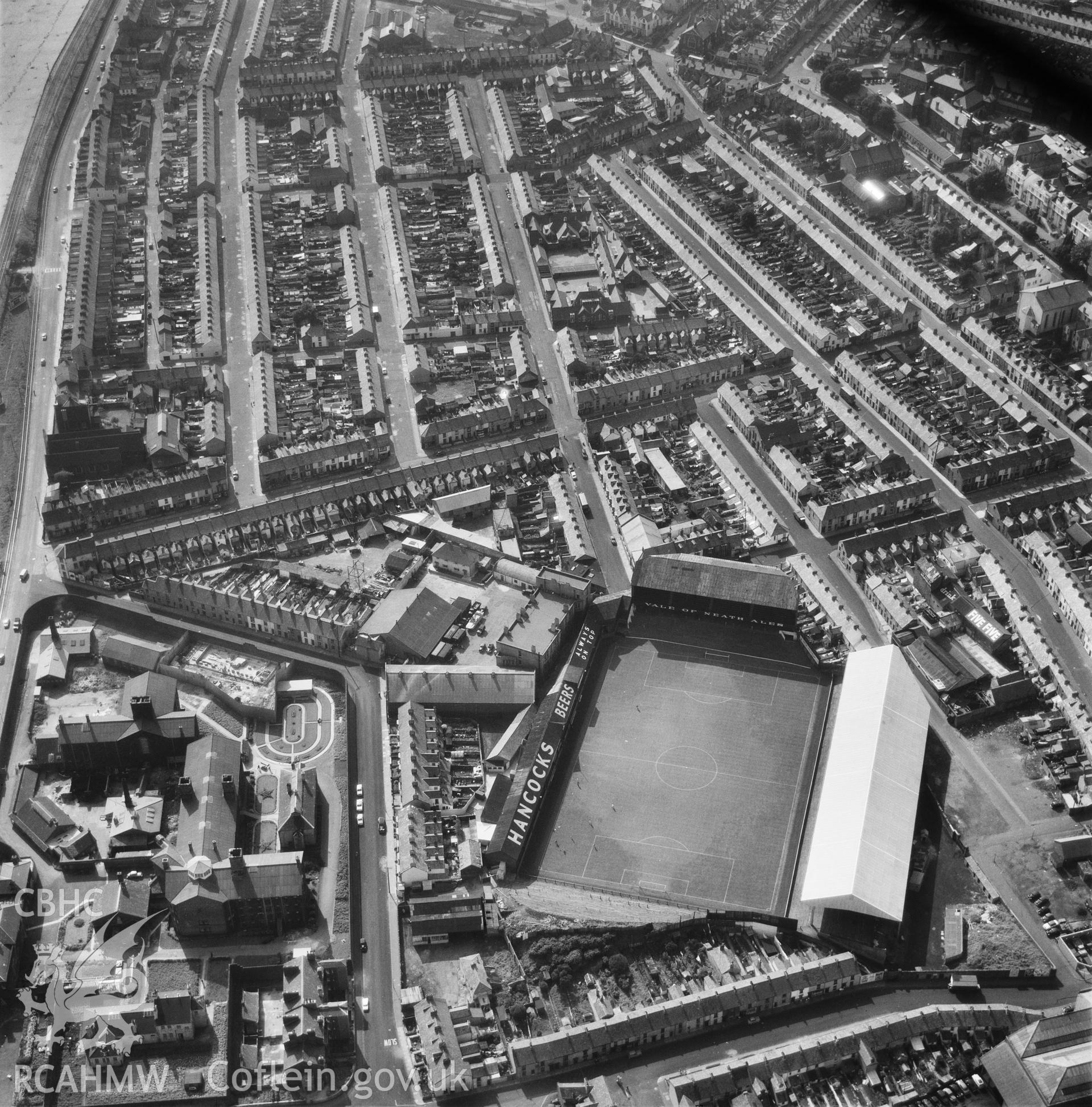 Black and white oblique aerial photograph showing the Vetch Field, Swansea and Swansea Prison, from Aerofilms album Swansea, taken by Aerofilms Ltd and dated 1959.
