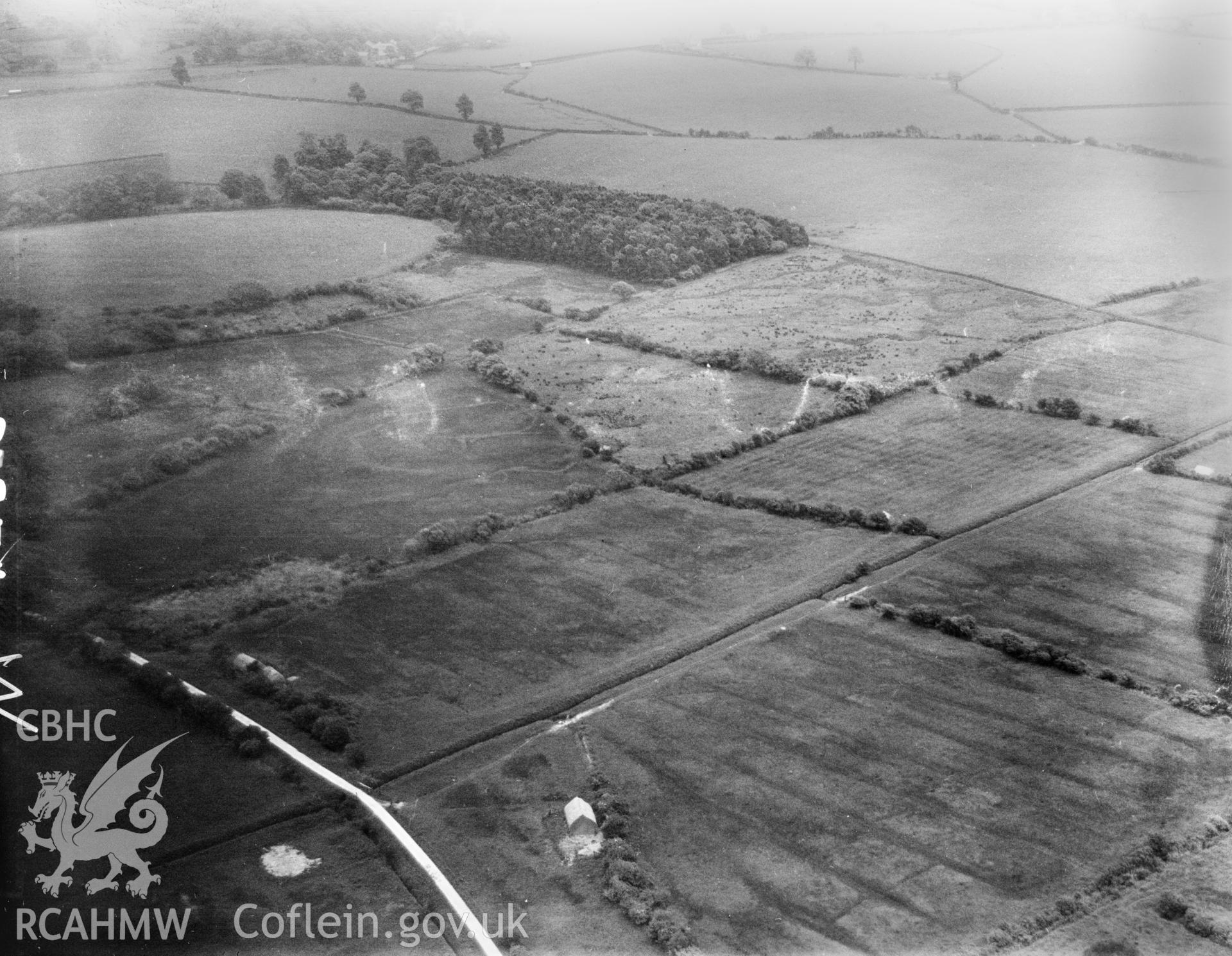 Showing area south west of Margam, including the Ropeyard Plantation and Upper Mother Ditch. Now the site of Eglwys Nunydd Reservoir, oblique aerial view. 5?x4? black and white glass plate negative.