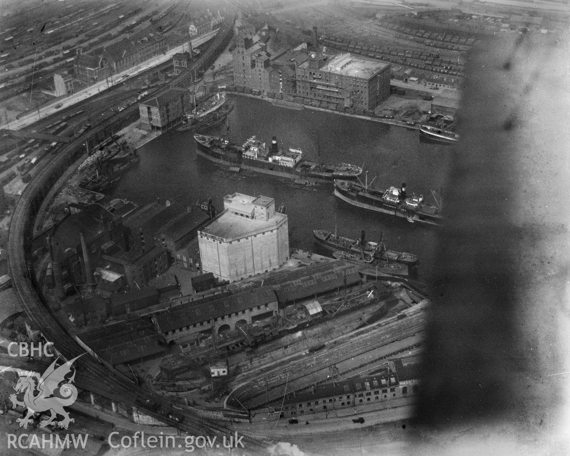 View of Cardiff East Bute Dock showing new Spillers biscuit factory, oblique aerial view. 5?x4? black and white glass plate negative.