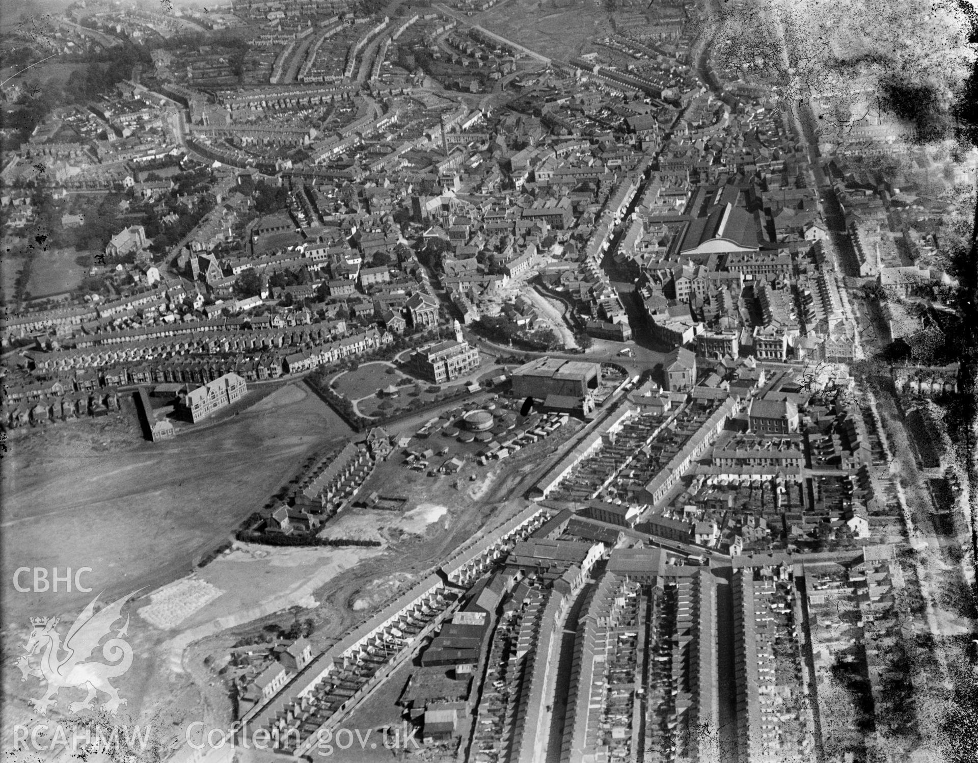 General view of Llanelli showing Town Hall and fair, oblique aerial view. 5?x4? black and white glass plate negative.