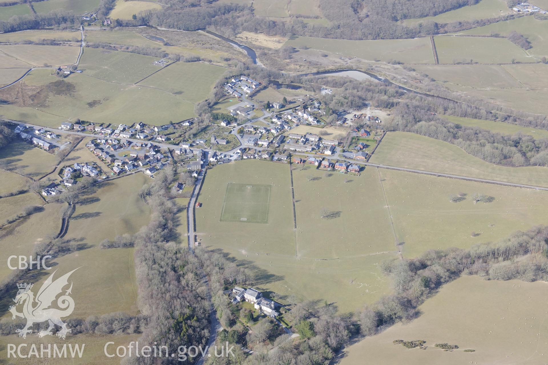 Castle Hill country house, with Llanilar to the north, south east of Aberystwyth. Oblique aerial photograph taken during the Royal Commission?s programme of archaeological aerial reconnaissance by Toby Driver on 2nd April 2015.