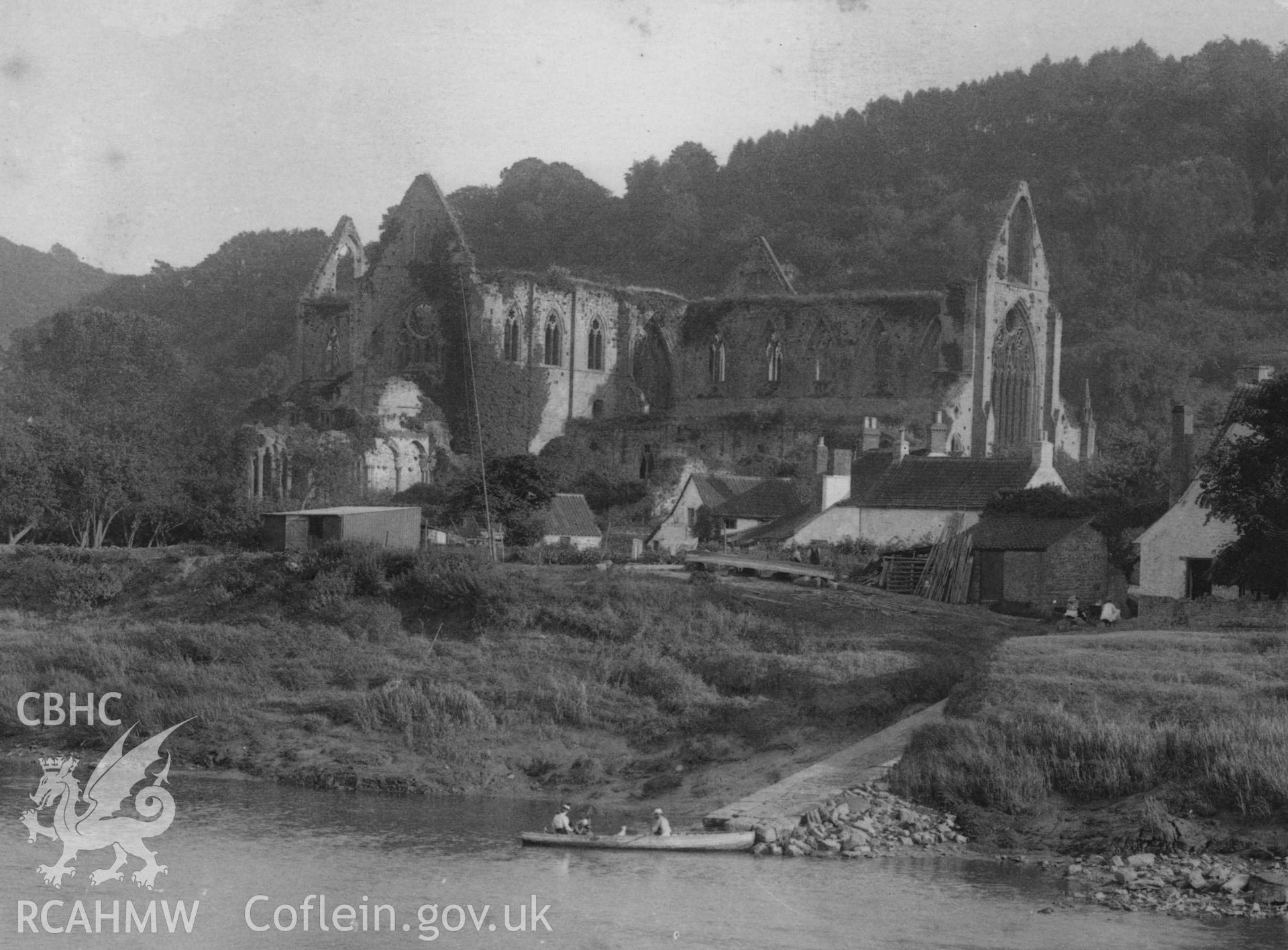Digital copy of a landscape view of Tintern Abbey from the river.