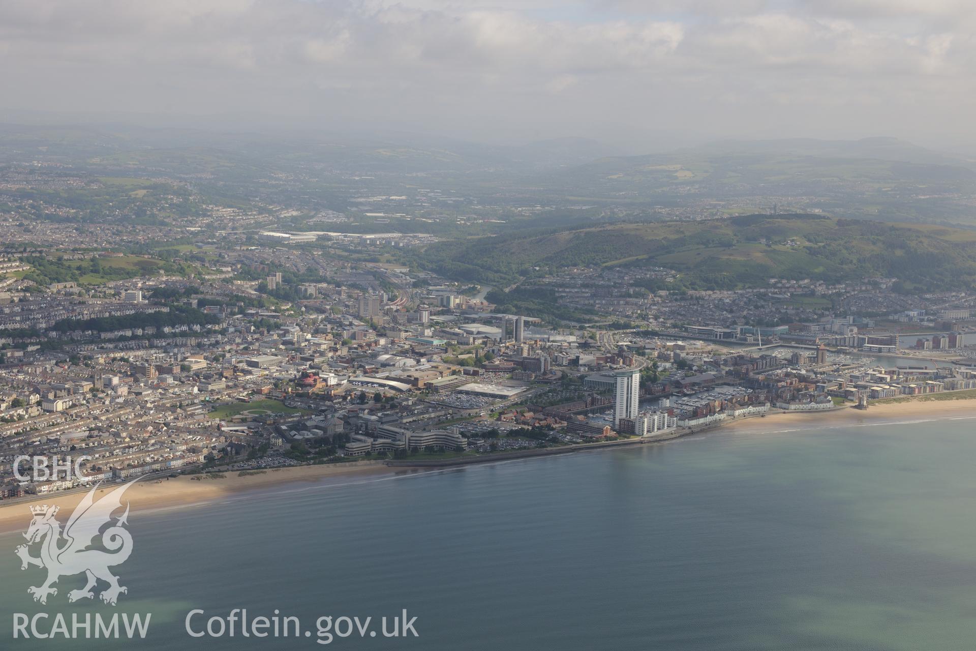 Views of Swansea prison, County Hall, Meridian Quay and south dock, Swansea, taken from Swansea Bay. Oblique aerial photograph taken during the Royal Commission's programme of archaeological aerial reconnaissance by Toby Driver on 19th June 2015.