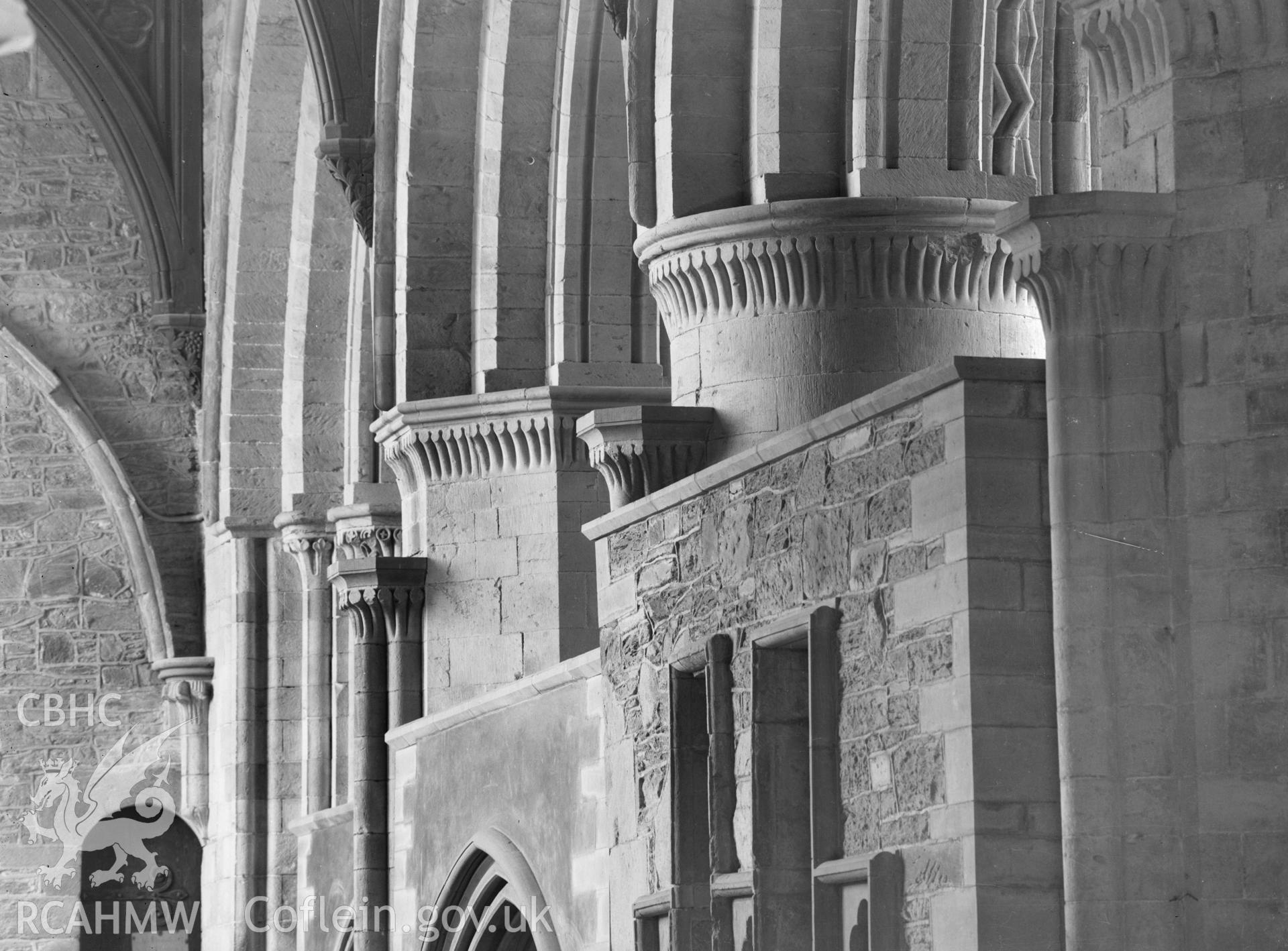 Digital copy of a black and white nitrate negative showing detailed view of the north aisle in presbytery at St. David's Cathedral, taken by E.W. Lovegrove, July 1936.