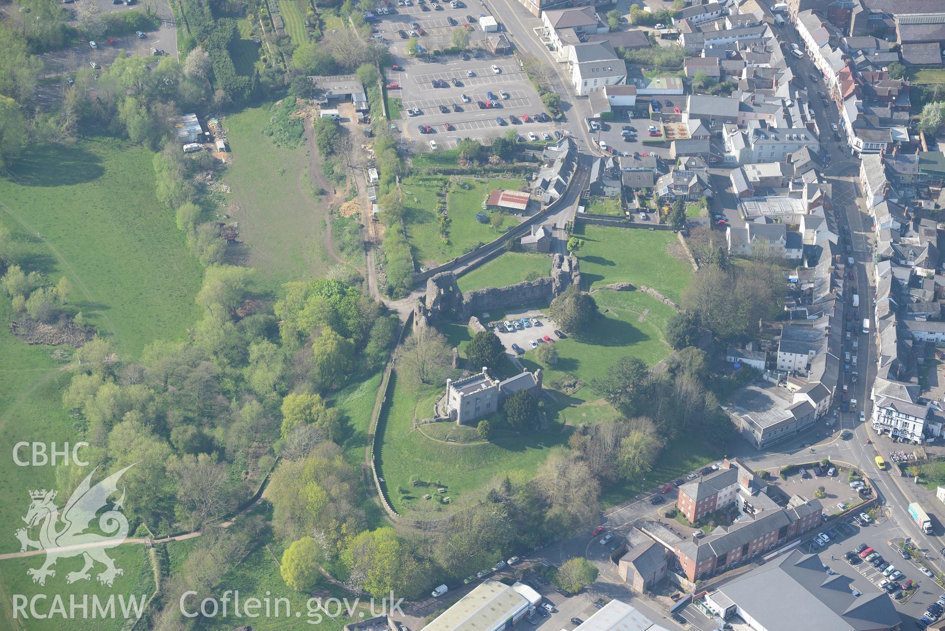 Abergavenny including the Castle, Castle Garden and Museum; Corn Mill; Tannery and Lulworth House. Oblique aerial photograph taken during the Royal Commission's programme of archaeological aerial reconnaissance by Toby Driver on 21st April 2015.