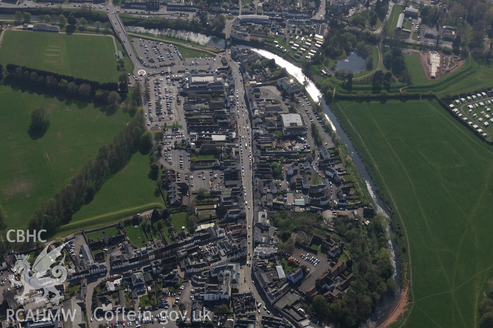 Monmouth Bridge and Gate. Oblique aerial photograph taken during the Royal Commission's programme of archaeological aerial reconnaissance by Toby Driver on 15th April 2015.