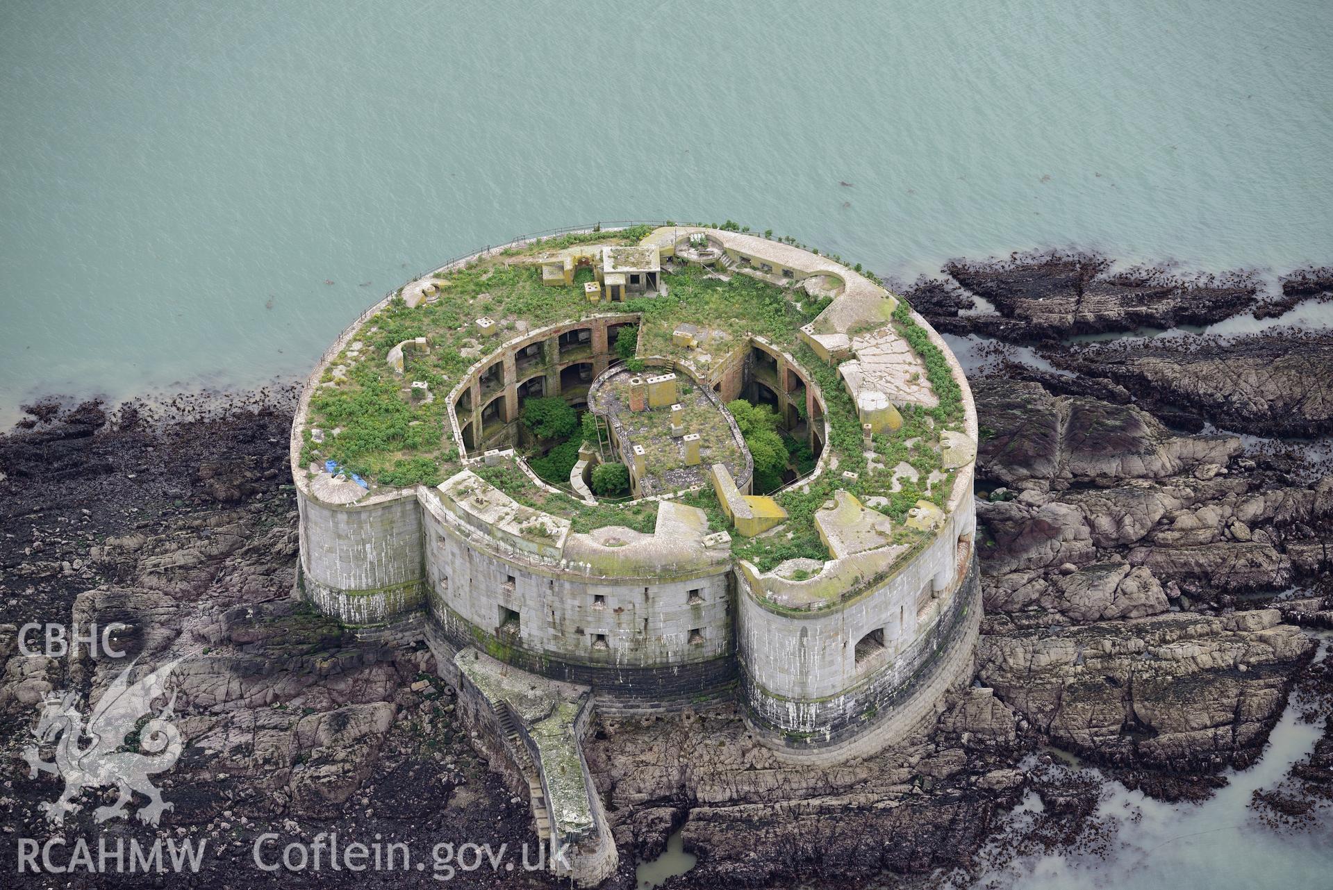 Stack Rock Fort, at extreme low tide. Baseline aerial reconnaissance survey for the CHERISH Project. ? Crown: CHERISH PROJECT 2017. Produced with EU funds through the Ireland Wales Co-operation Programme 2014-2020. All material made freely available through the Open Government Licence.