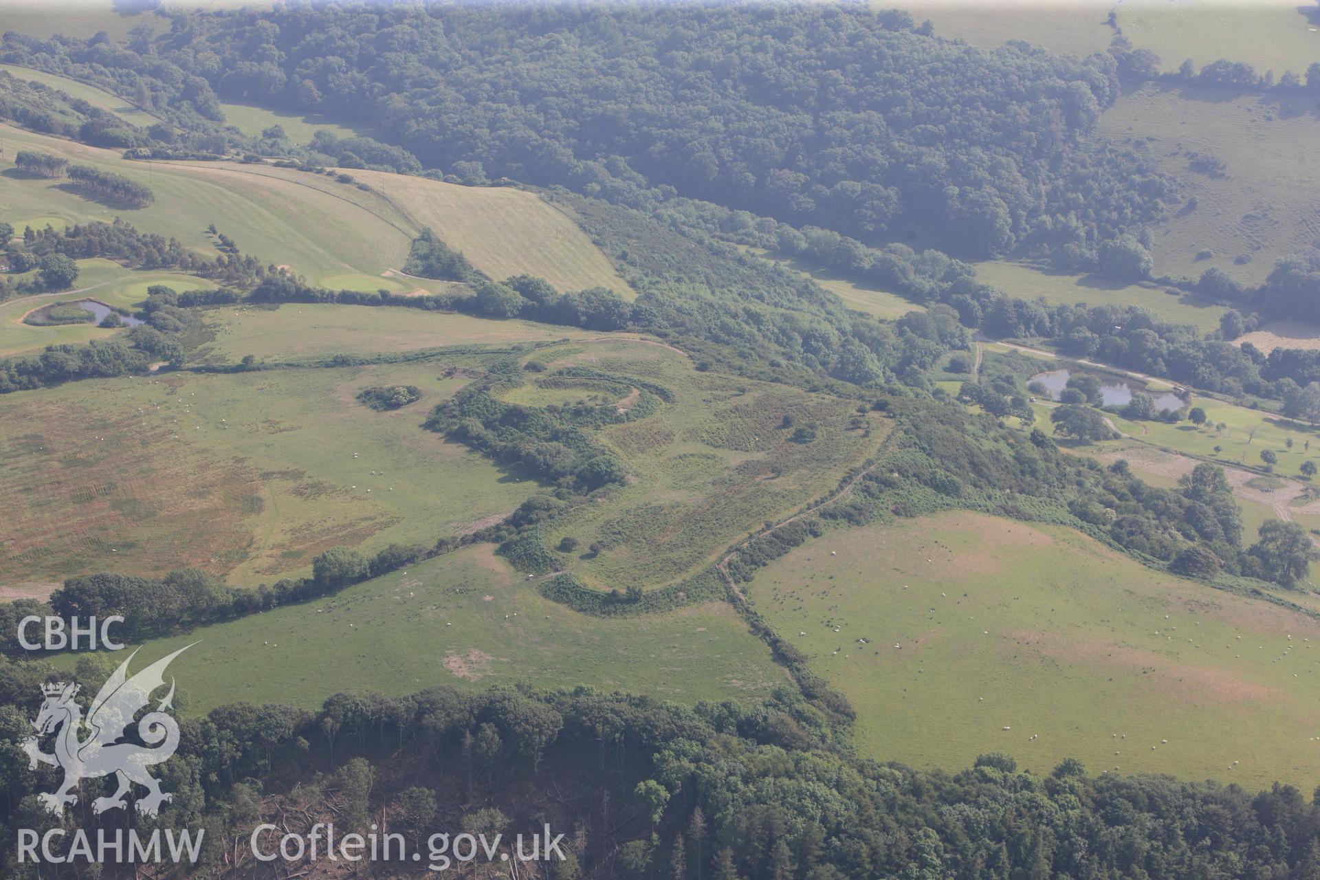 Caer Penrhos hillfort, east of Llanrhystud. Oblique aerial photograph taken during the Royal Commission?s programme of archaeological aerial reconnaissance by Toby Driver on 12th July 2013.