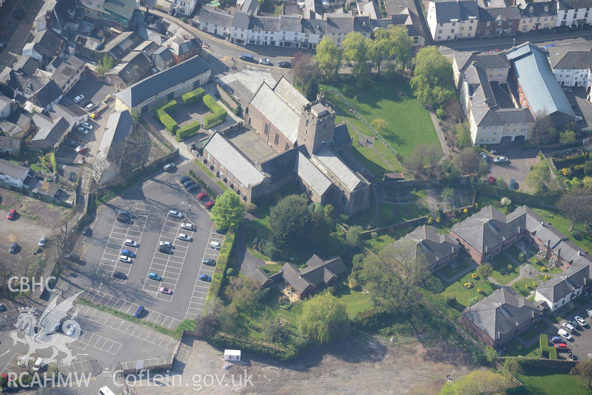 Abergavenny including St. Mary's Church; Pavillion Cinema and Old Fire Station. Oblique aerial photograph taken during the Royal Commission's programme of archaeological aerial reconnaissance by Toby Driver on 21st April 2015.