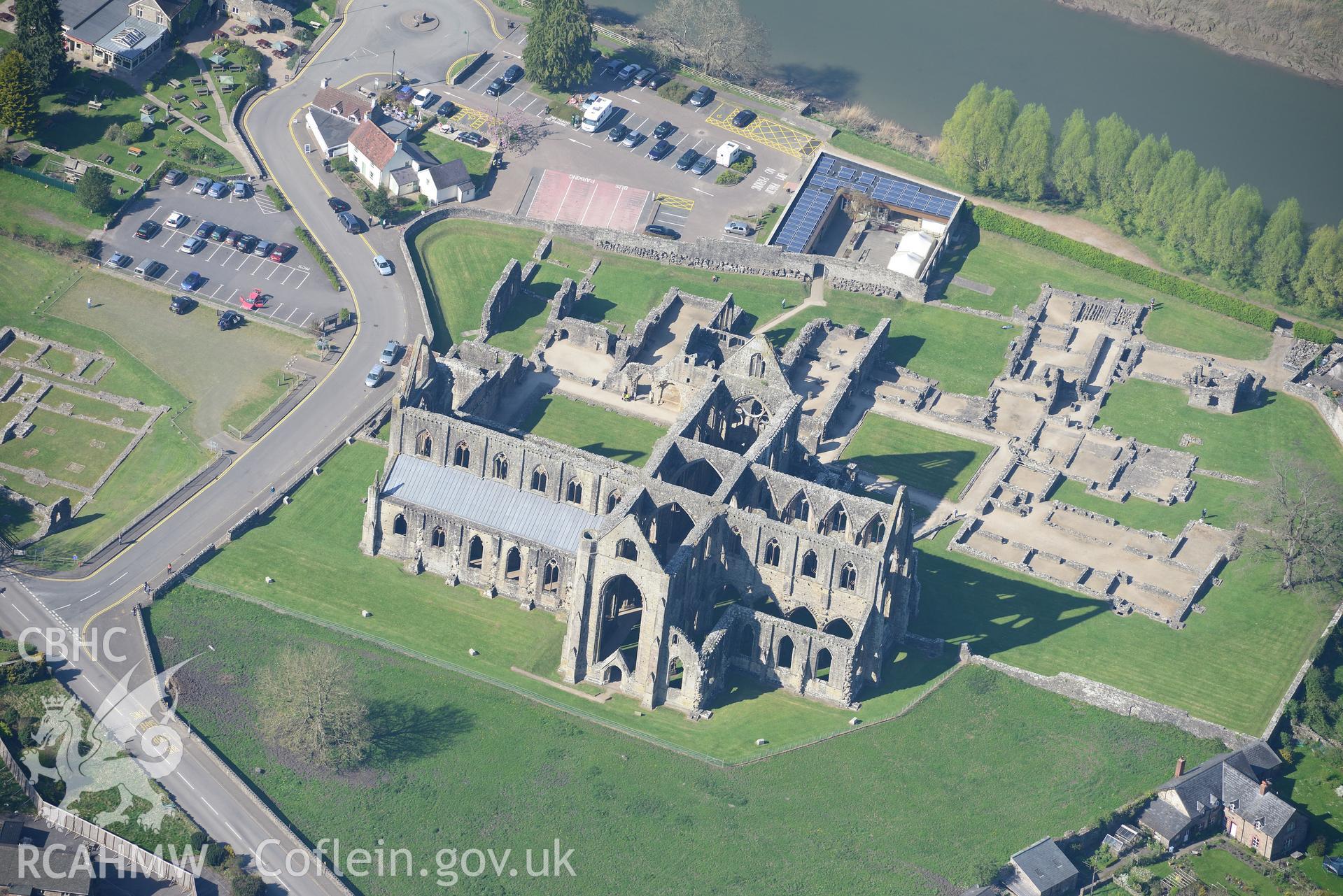 Tintern Abbey and Beaufort Cottage. Oblique aerial photograph taken during the Royal Commission's programme of archaeological aerial reconnaissance by Toby Driver on 21st April 2015
