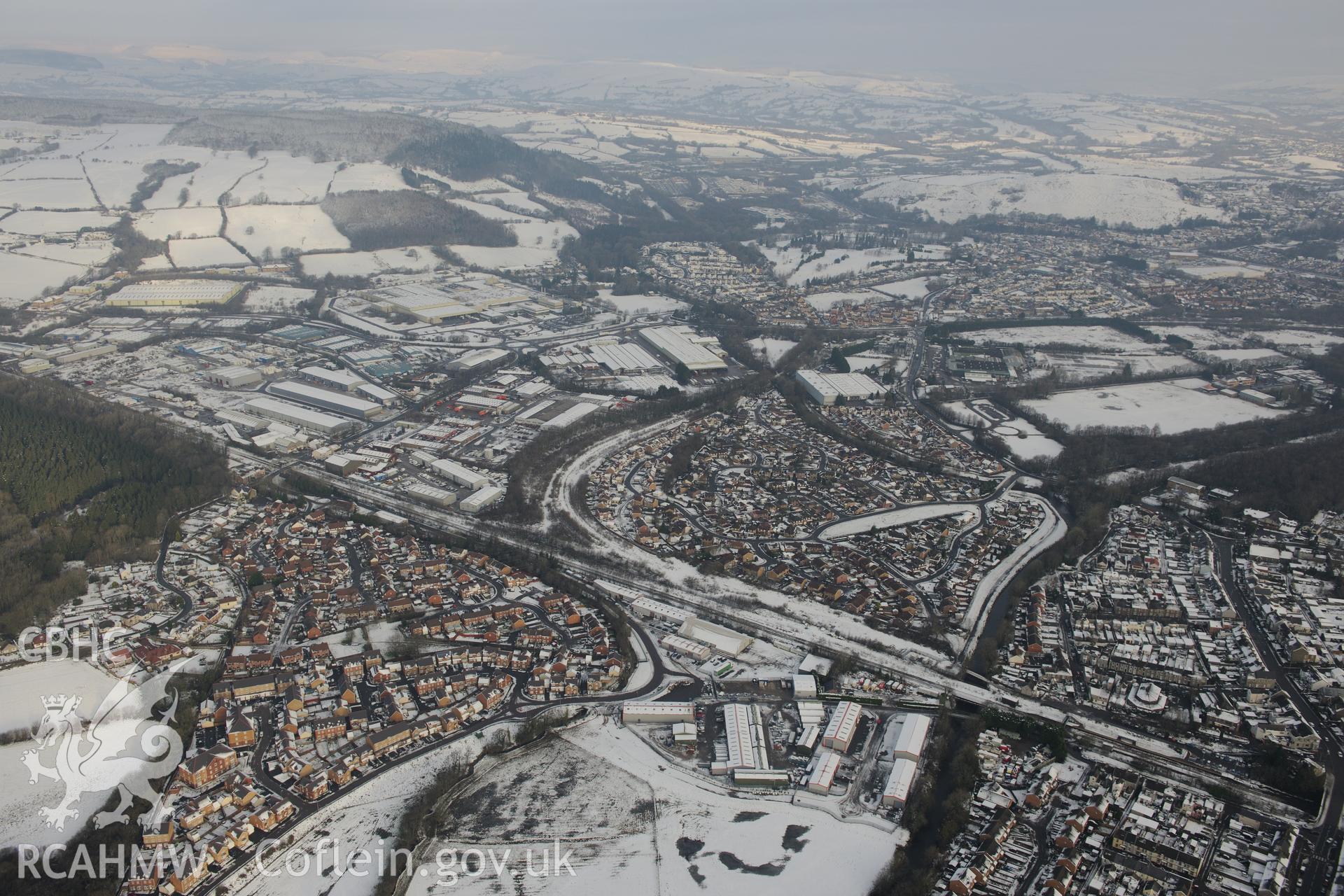 Pontyclun, viewed from the south west. Oblique aerial photograph taken during the Royal Commission?s programme of archaeological aerial reconnaissance by Toby Driver on 24th January 2013.