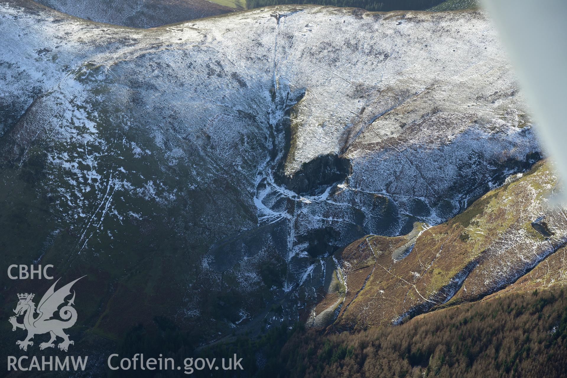 Minllyn slate and slab quarry, south west of Dinas Mawddwy, Dolgellau. Oblique aerial photograph taken during the Royal Commission's programme of archaeological aerial reconnaissance by Toby Driver on 4th February 2015.