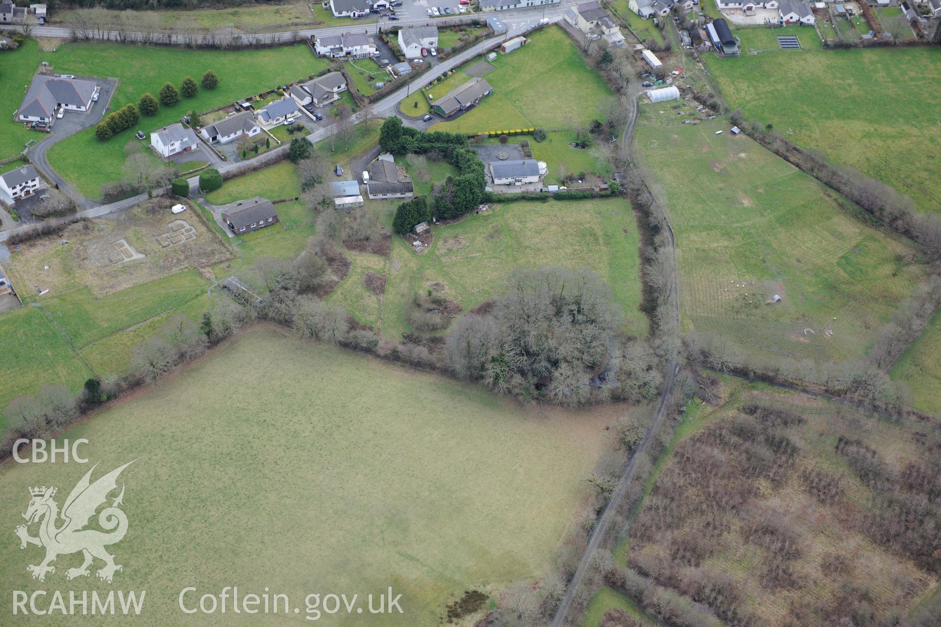 Castell Nant-y-Garan motte, Penrhiw-llan, between Newcastle Emlyn and Llandysul. Oblique aerial photograph taken during the Royal Commission's programme of archaeological aerial reconnaissance by Toby Driver on 13th March 2015.