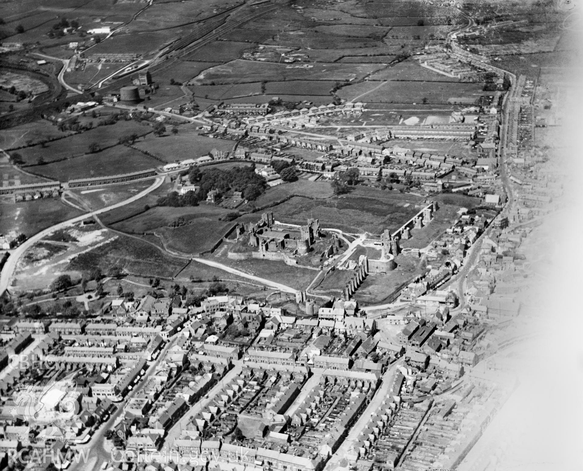 General view of Caerphilly, showing castle, oblique aerial view. 5?x4? black and white glass plate negative.