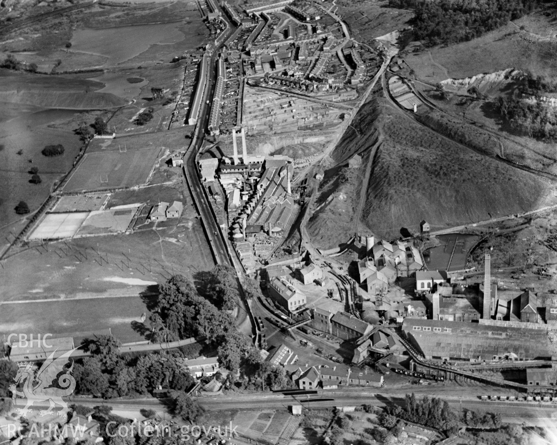 View of Powell Duffryn Steam Coal Co. (Britannia), Pengam, , including rugby ground, oblique aerial view. 5?x4? black and white glass plate negative.