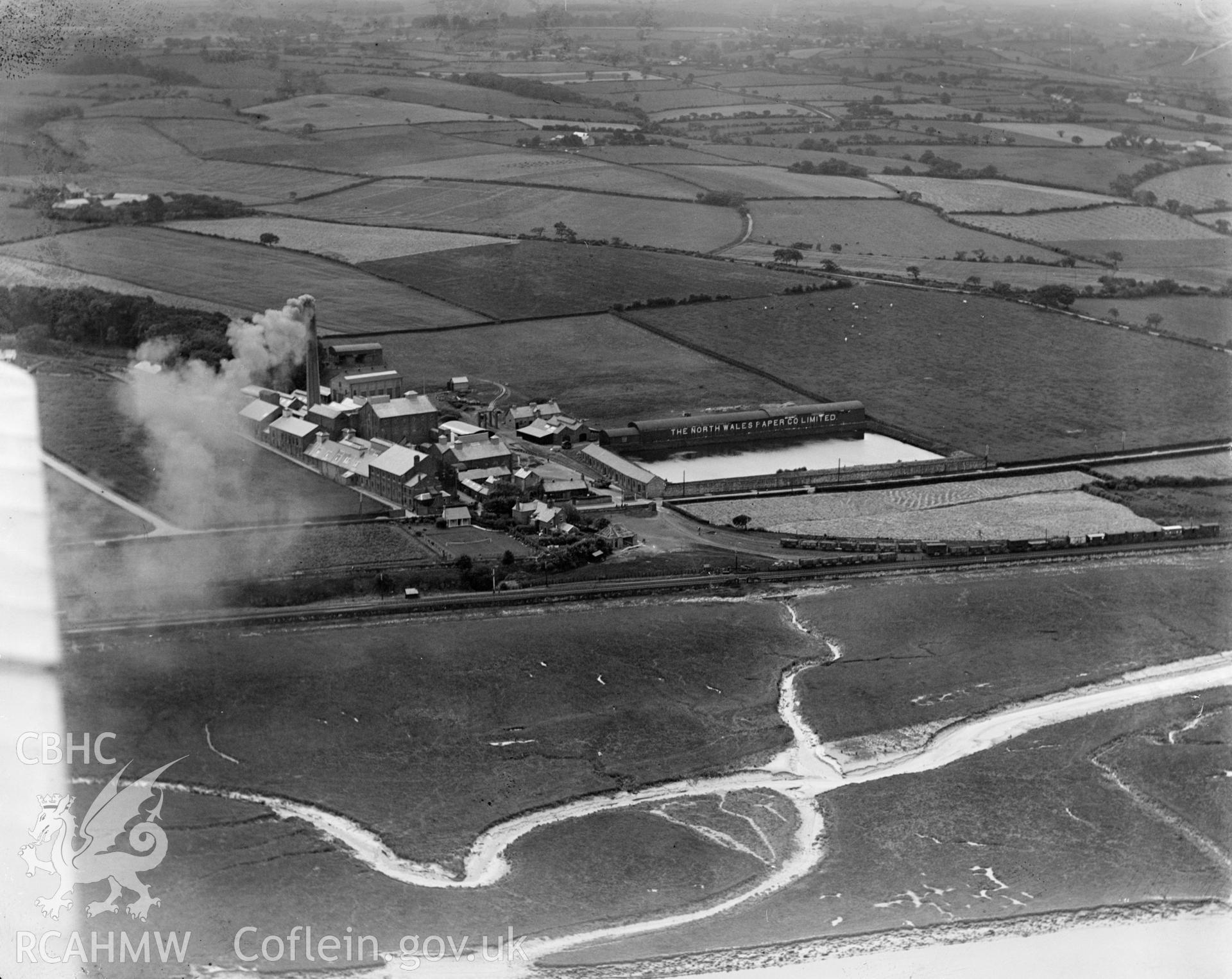 View of the North Wales Paper Company Ltd, Flint, oblique aerial view. 5?x4? black and white glass plate negative.