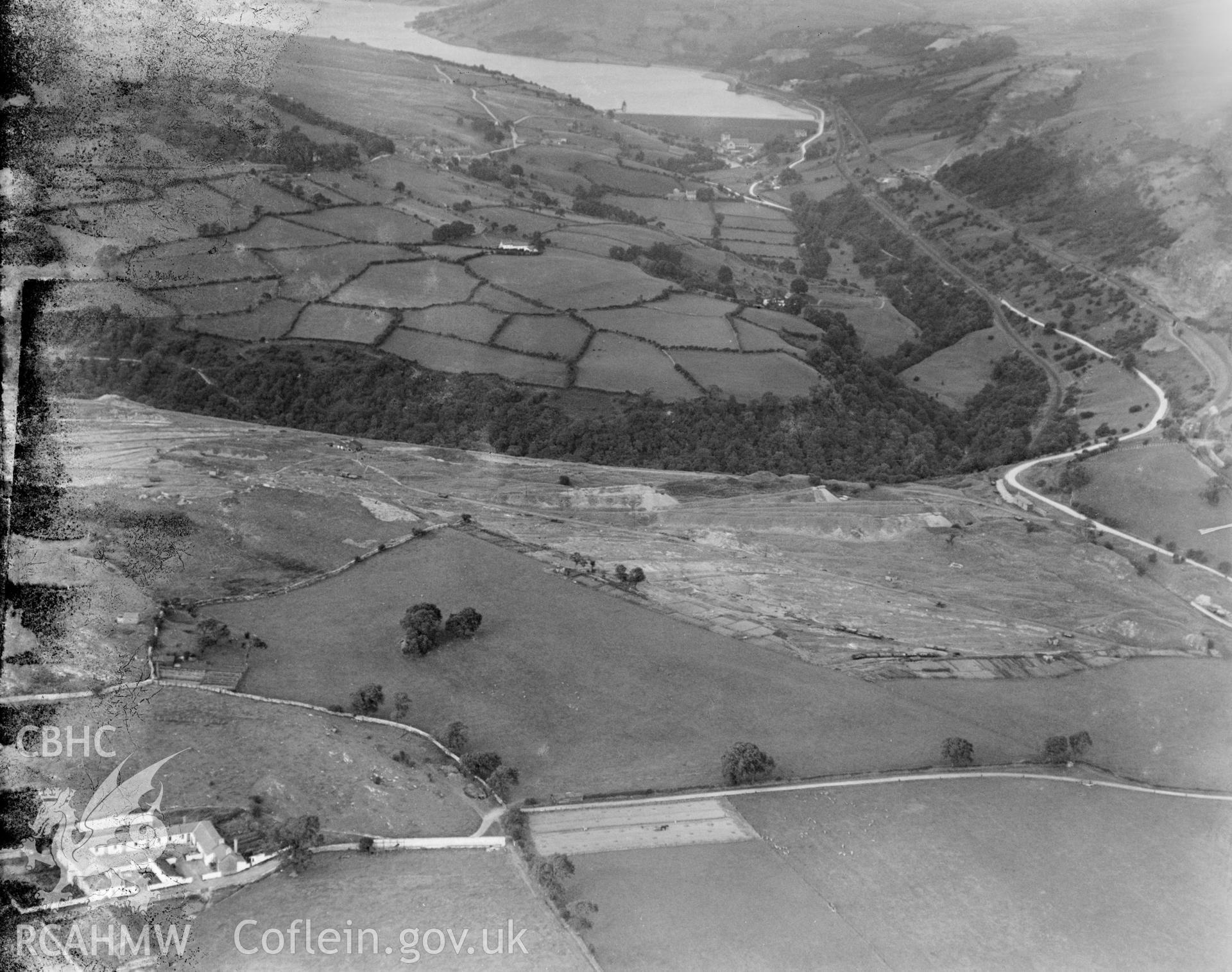 View showing Castle Farm, looking north from above Morlais Castle Golf Club to the Taff Fechan Reservoir, oblique aerial view. 5?x4? black and white glass plate negative.
