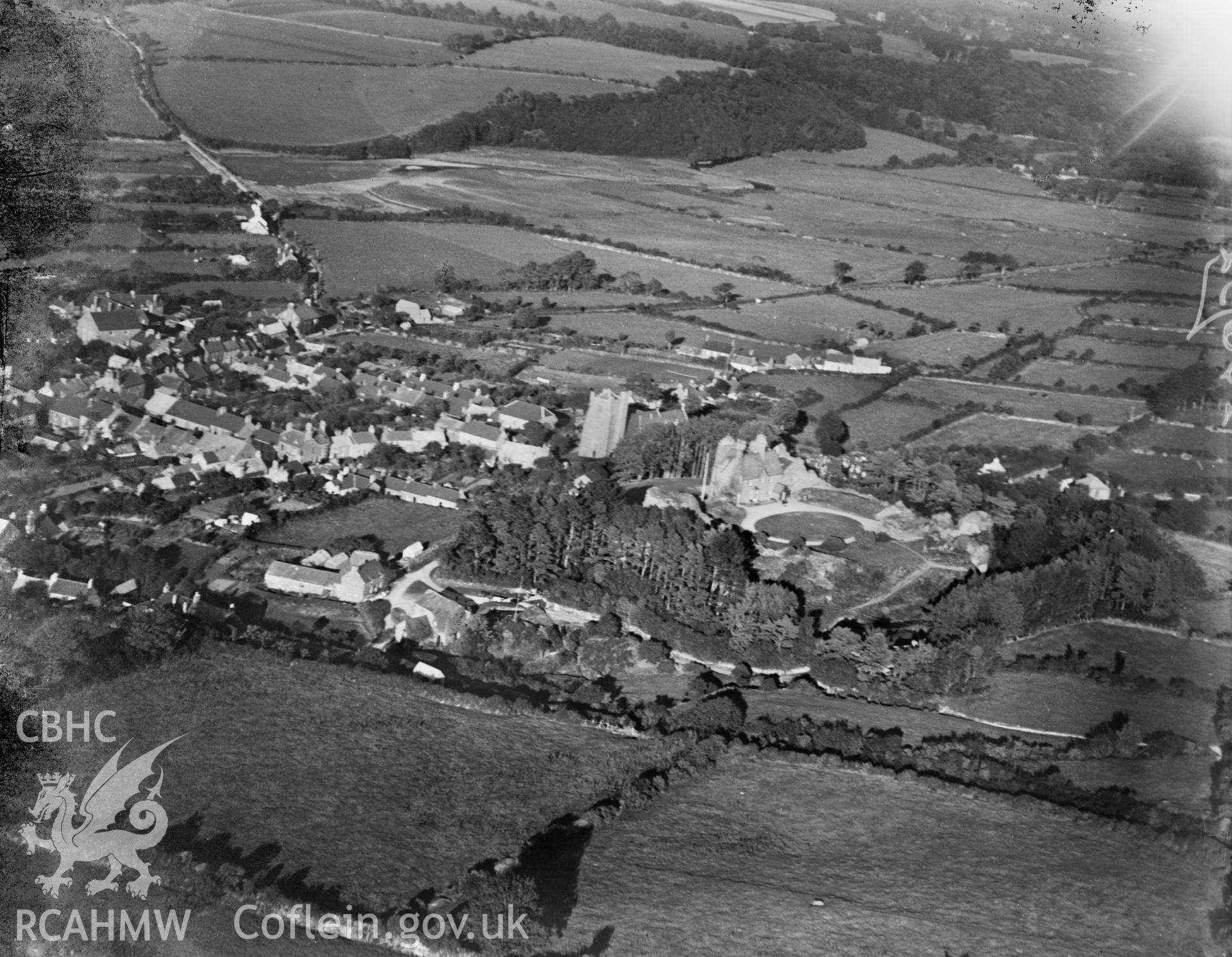 View of Newport, Pembrokeshire, showing castle, oblique aerial view. 5?x4? black and white glass plate negative.