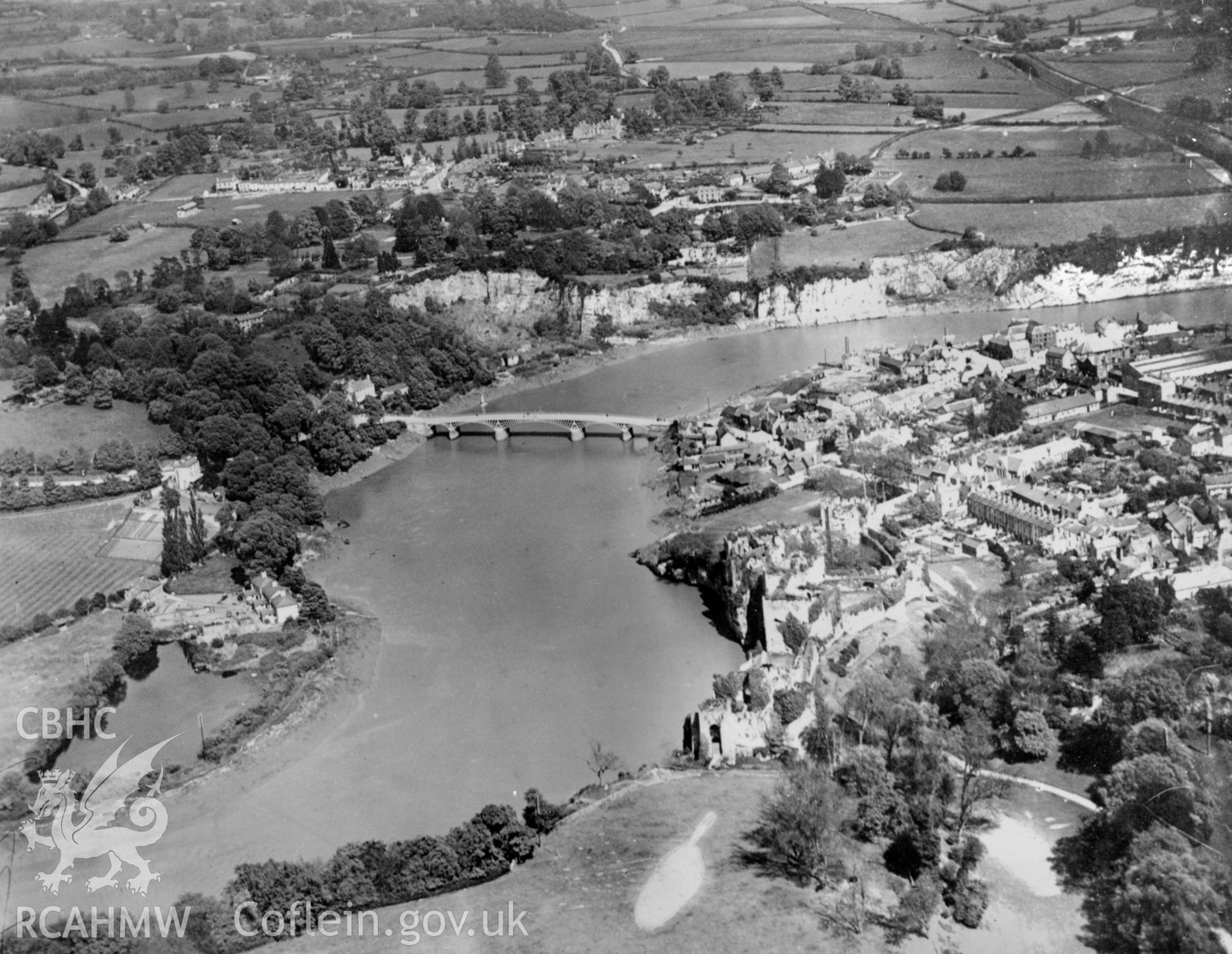 View of Chepstow showing the road bridge over the river Wye and the castle. Oblique aerial photograph, 5?x4? BW glass plate.