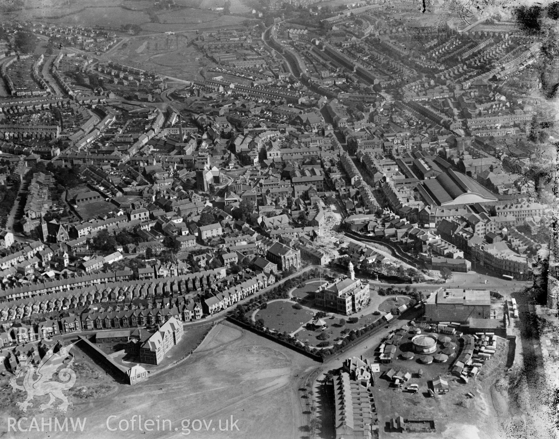 General view of Llanelli showing Town Hall and fair, oblique aerial view. 5?x4? black and white glass plate negative.