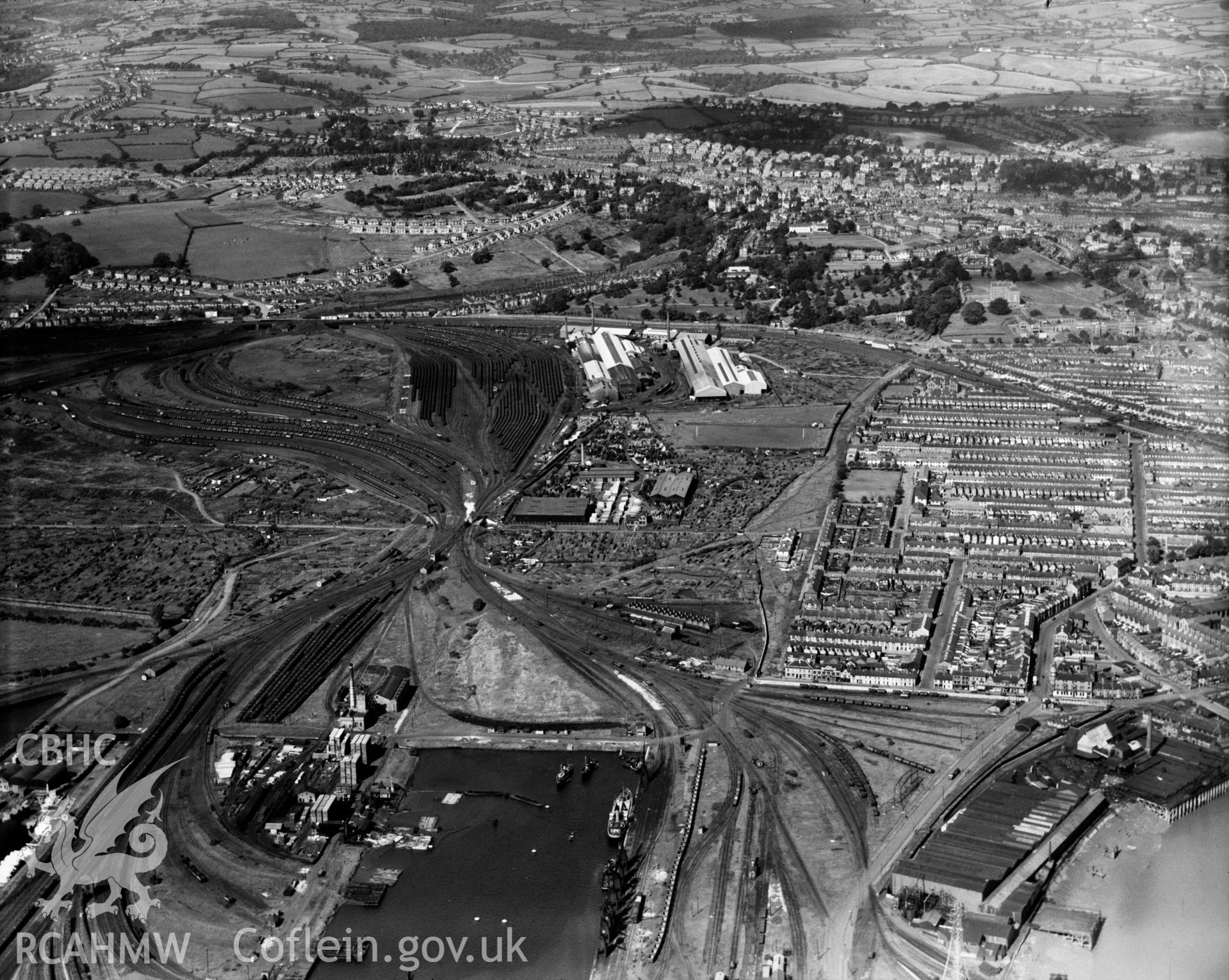 General view of Newport showing docks, oblique aerial view. 5?x4? black and white glass plate negative.