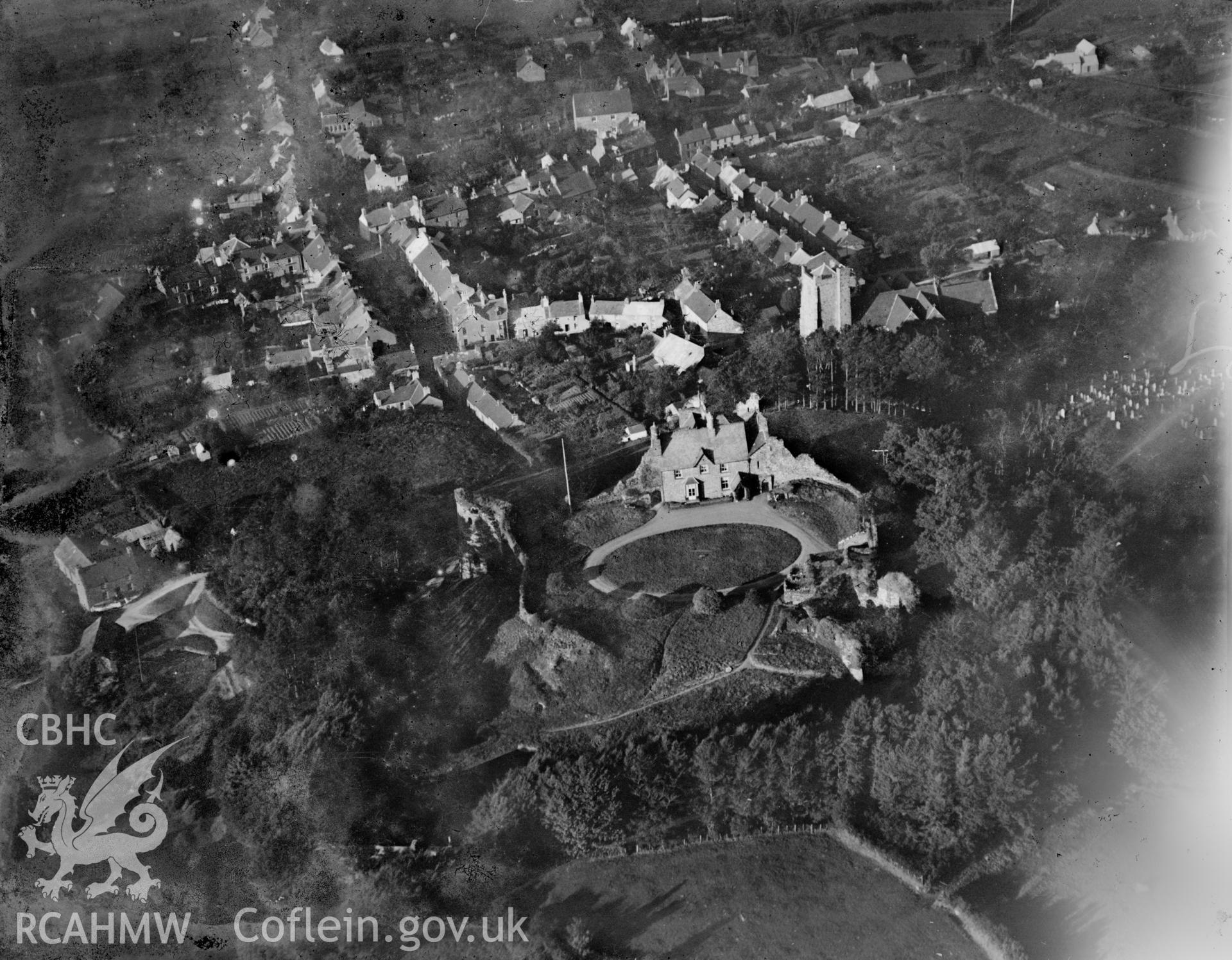 View of Newport, Pembrokeshire, showing castle, oblique aerial view. 5?x4? black and white glass plate negative.