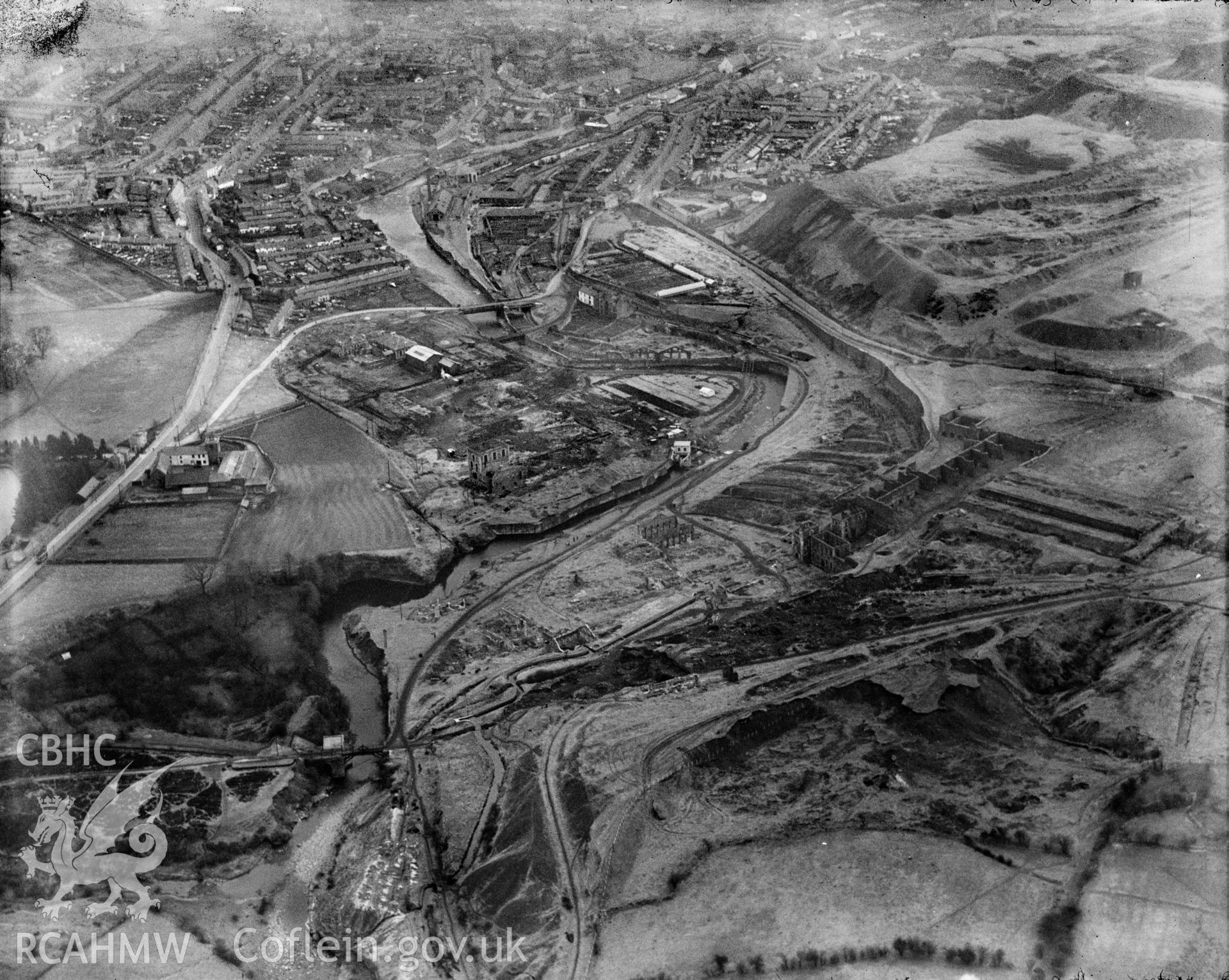 View of Williamstown, Merthyr Tydfil, showing ruined ironworks, oblique aerial view. 5?x4? black and white glass plate negative.