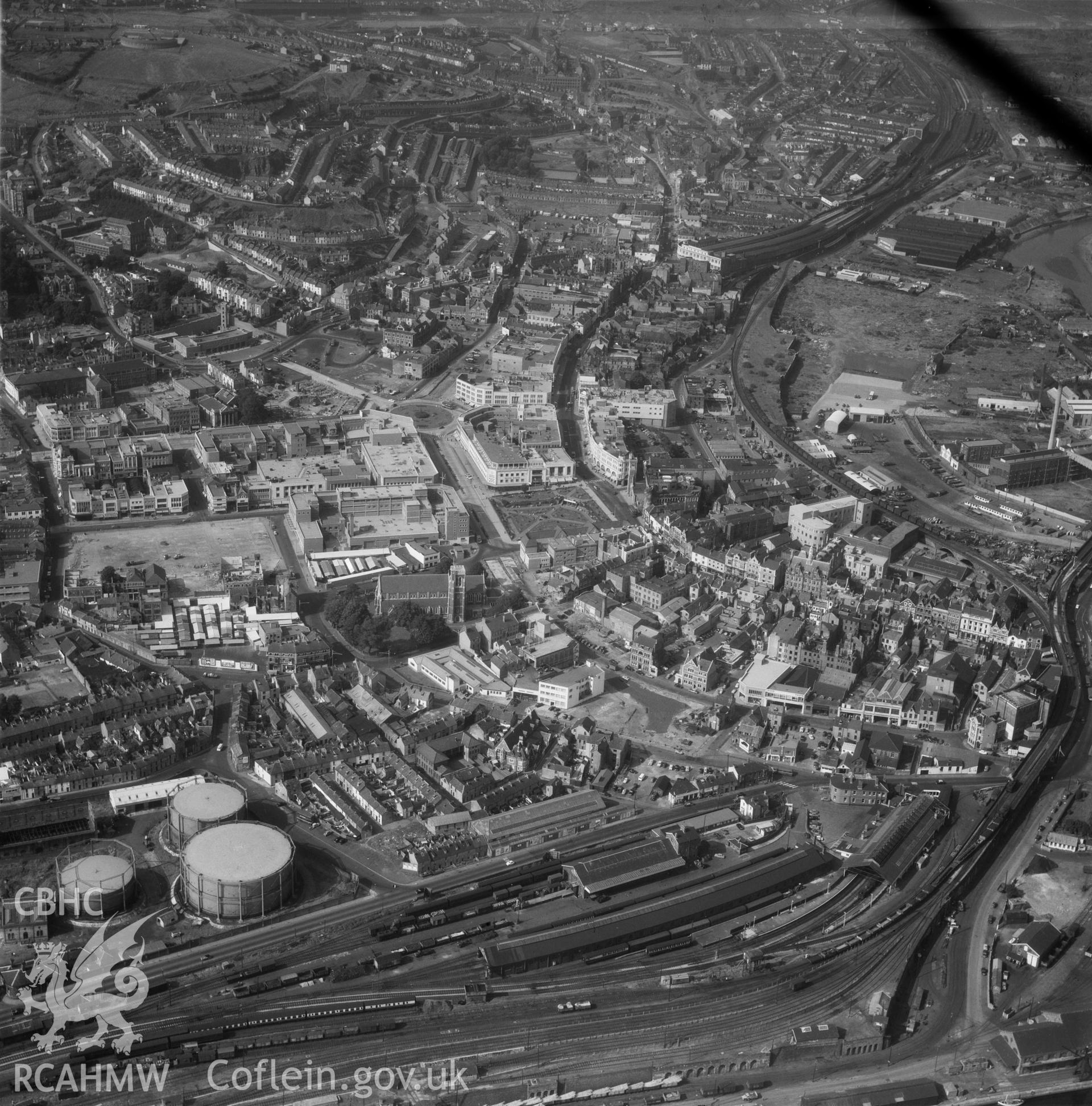 Black and white oblique aerial photograph showing Swansea, from Aerofilms album Swansea no W30, taken by Aerofilms Ltd and dated 1959.