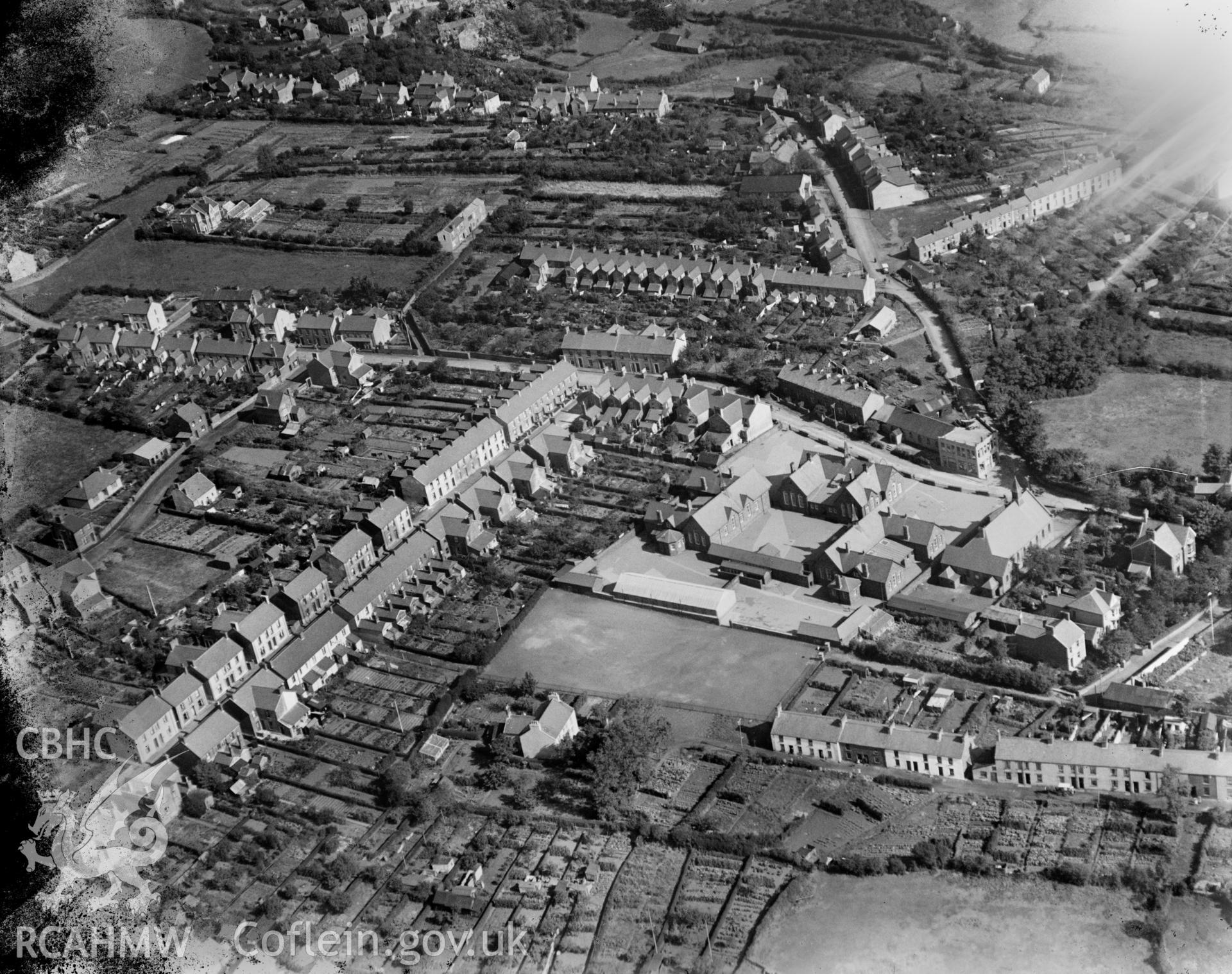 View of Pembrey showing school, oblique aerial view. 5?x4? black and white glass plate negative.