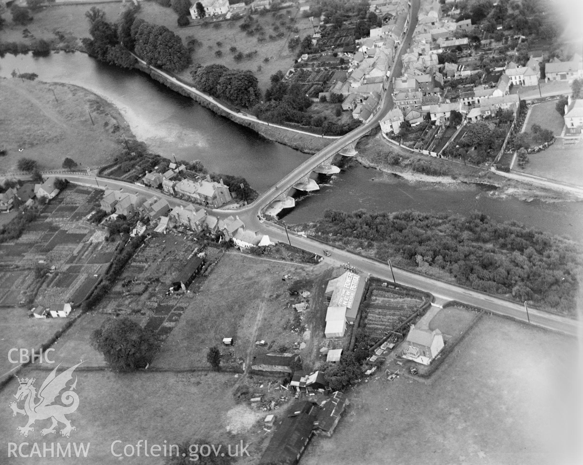 View of Usk showing bridge, oblique aerial view. 5?x4? black and white glass plate negative.