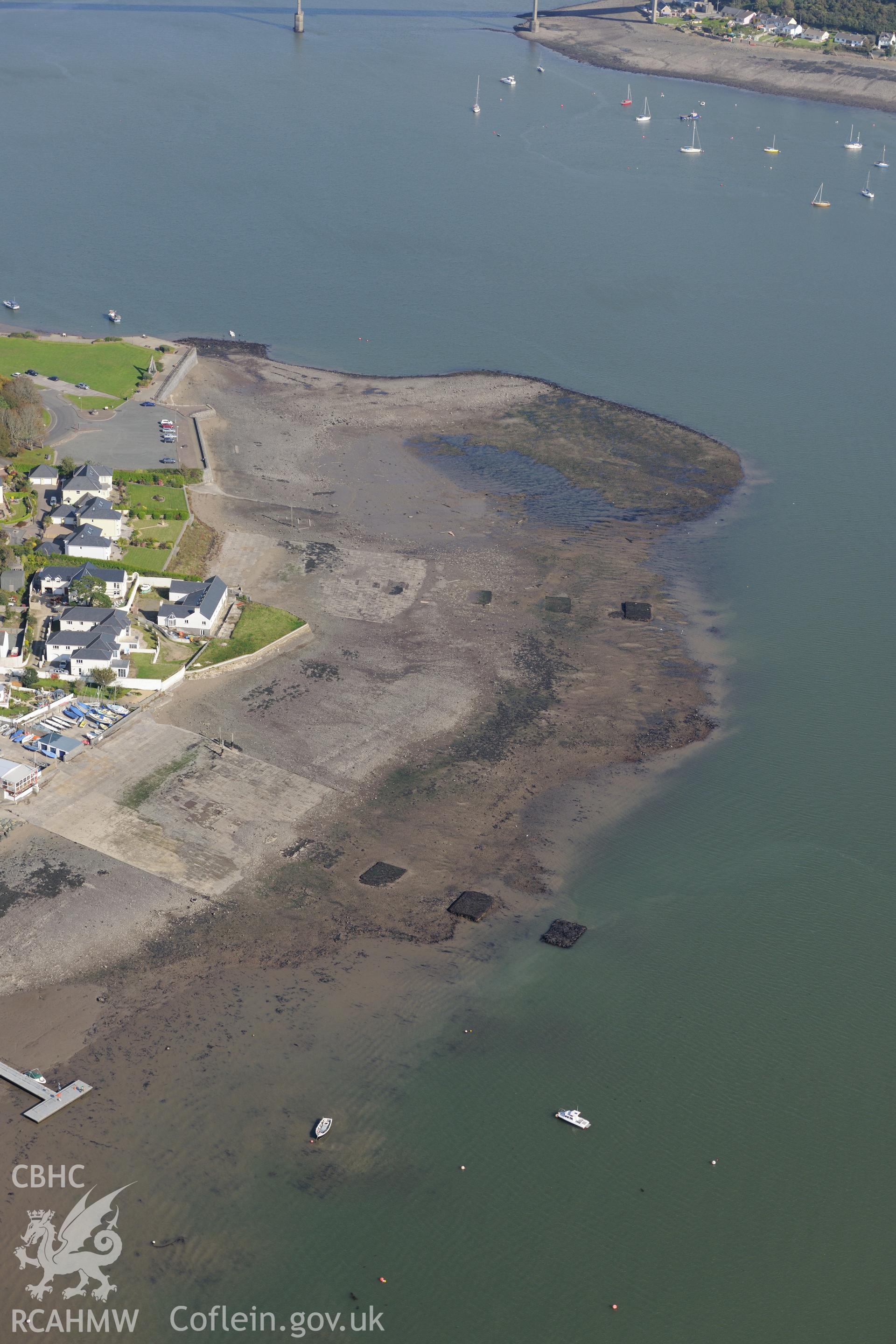 The town of Neyland, its shipyard and two embarkation hards, on the opposite side of the estuary to Pembroke Dock. Oblique aerial photograph taken during the Royal Commission's programme of archaeological aerial reconnaissance by Toby Driver on 30th September 2015.