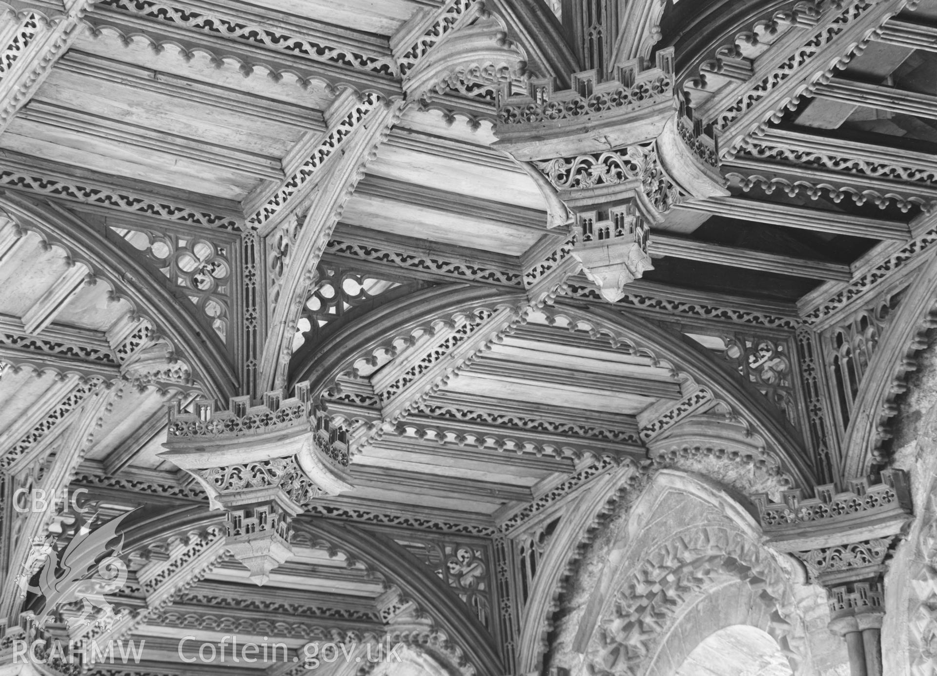 Digital copy of a black and white nitrate negative showing view of ceiling pendants at St David's Cathedral, taken by E.W. Lovegrove, July 1936.