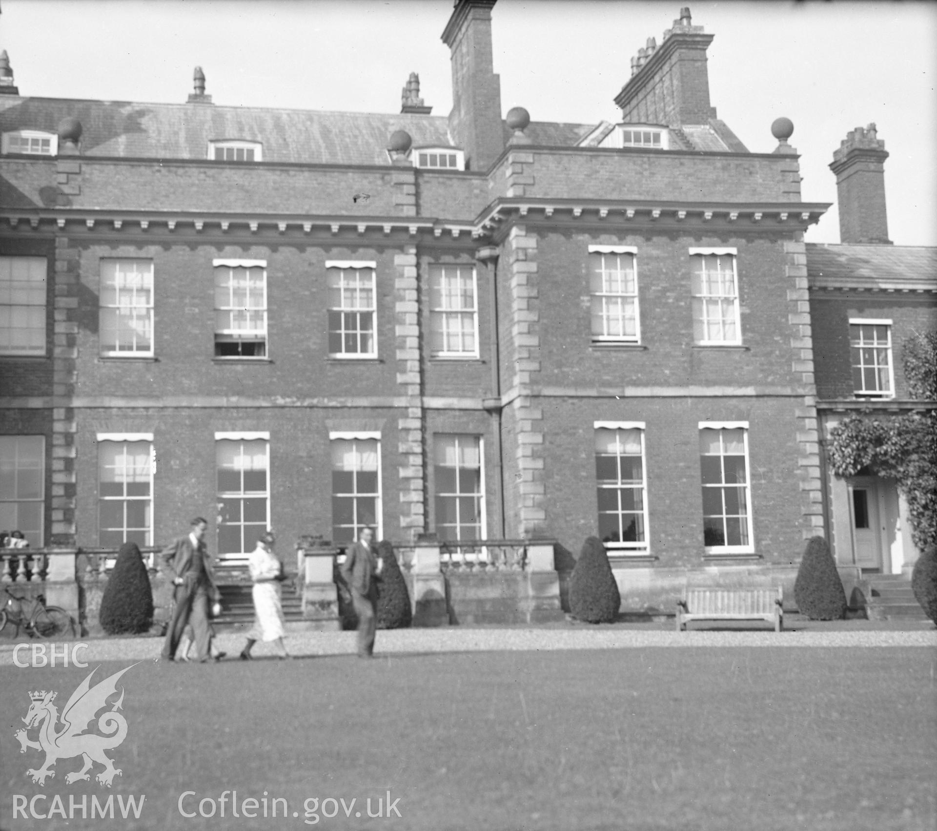 Digital copy of a black and white nitrate negative showing front of building in North Shropshire, captioned 'Larulnuis'.