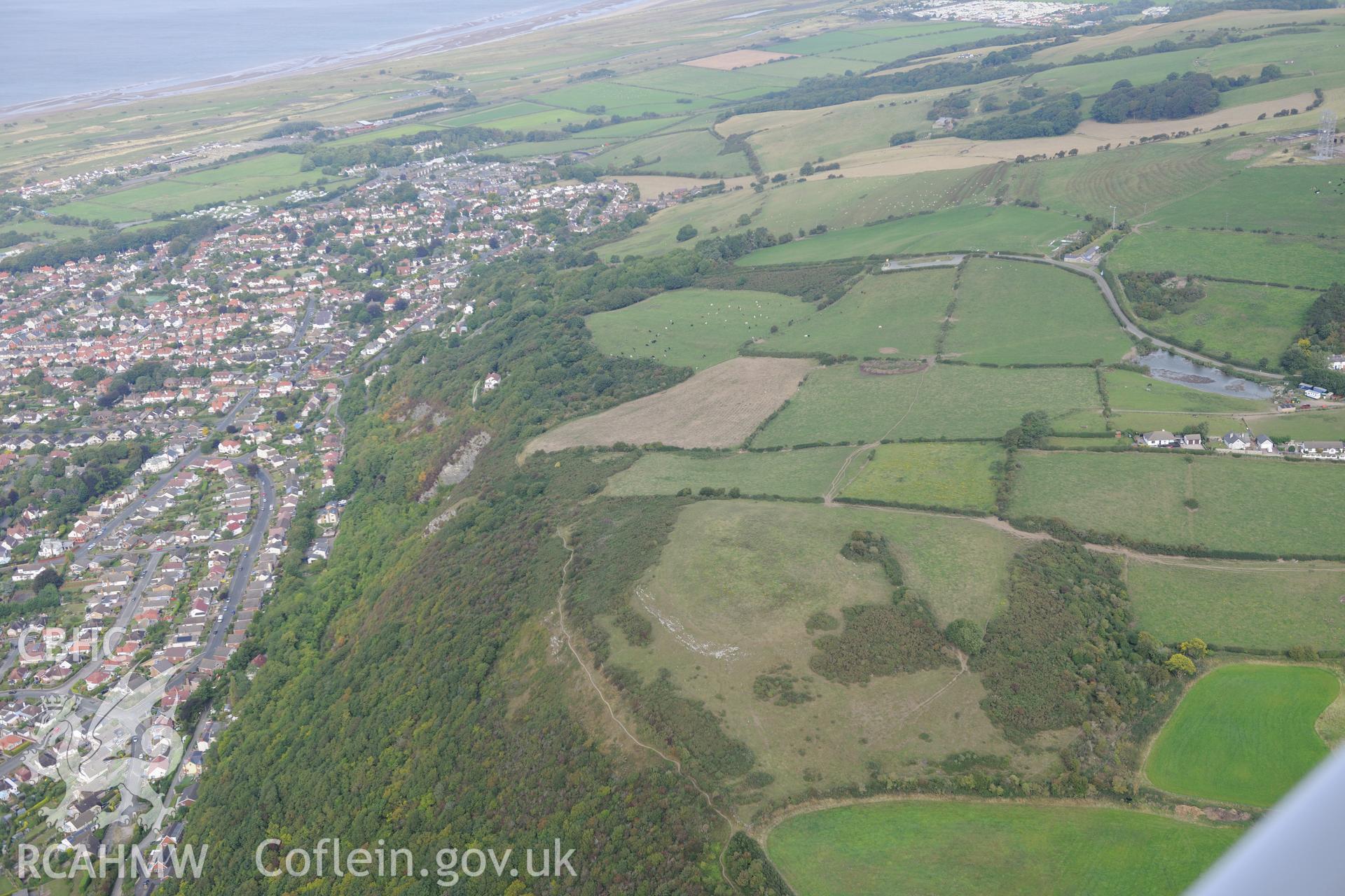 The town of Prestatyn. Oblique aerial photograph taken during the Royal Commission's programme of archaeological aerial reconnaissance by Toby Driver on 11th September 2015.