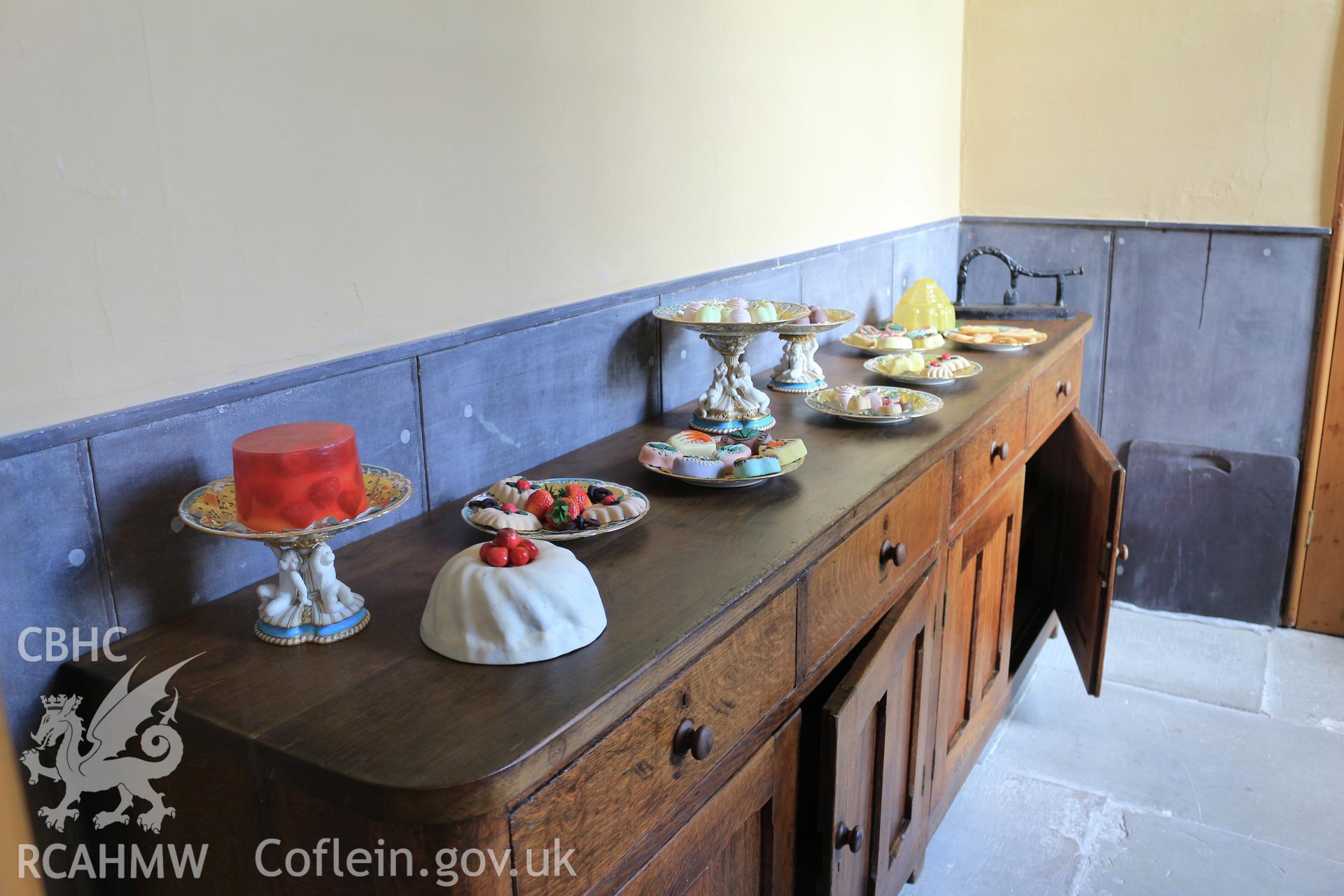 Photographic survey of Penrhyn Castle, Bangor Kitchens, display of desserts (wax models)
