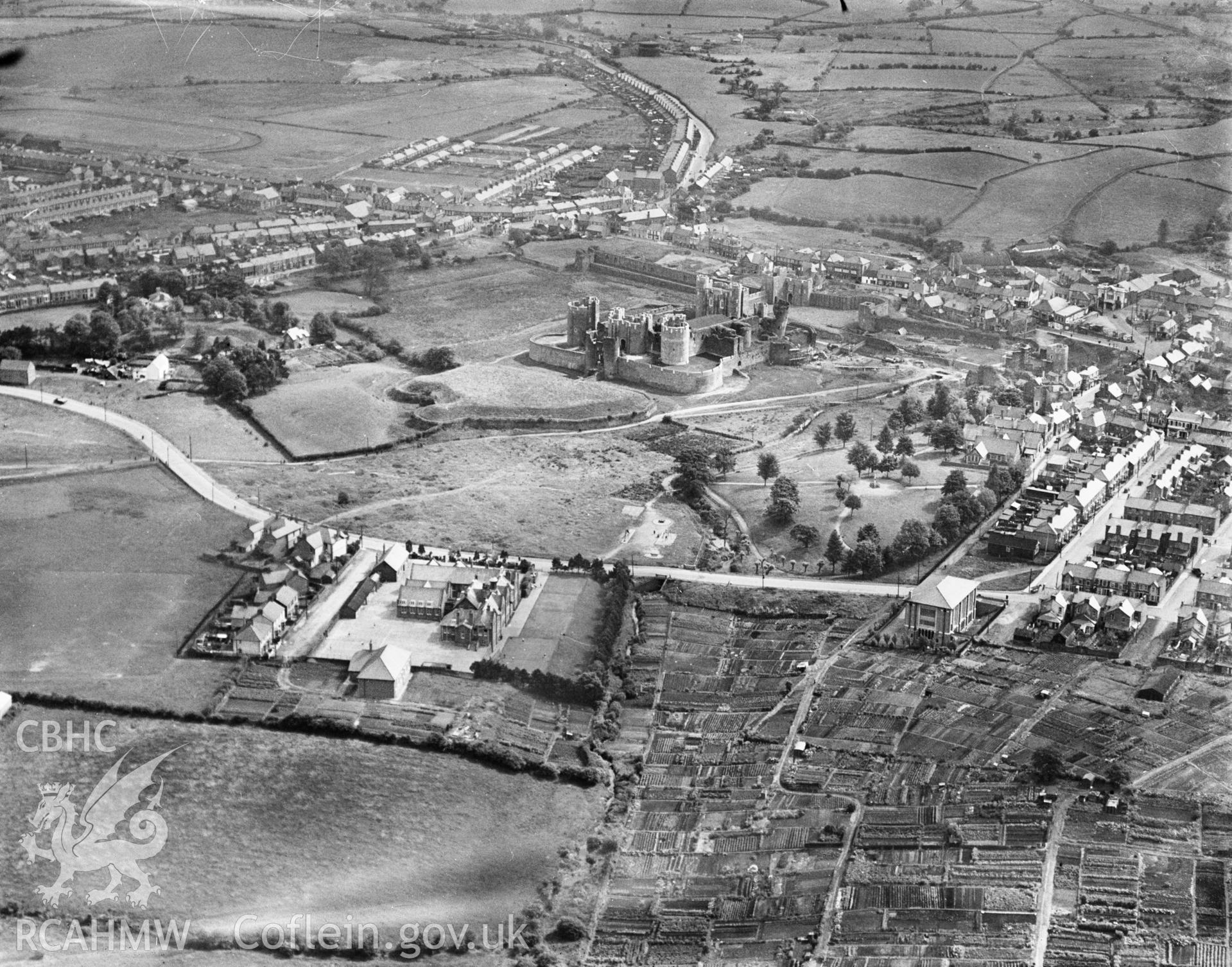 View of Caerphilly showing school, allotments and castle. Oblique aerial photograph, 5?x4? BW glass plate.