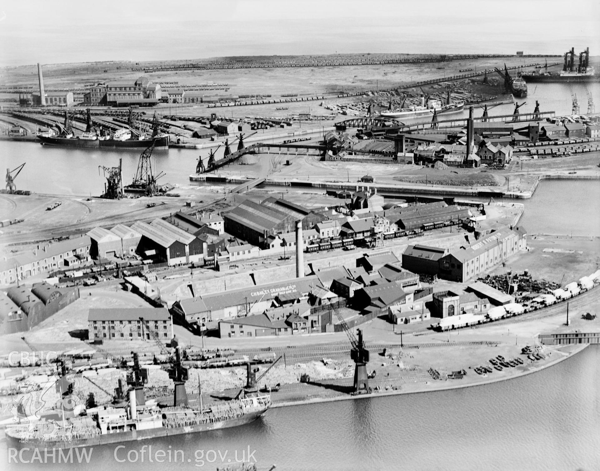 View of C.H. Bailey Ltd., dry dock owners & ship repairers and surrounding dockyard, Cardiff, oblique aerial view. 5?x4? black and white glass plate negative.