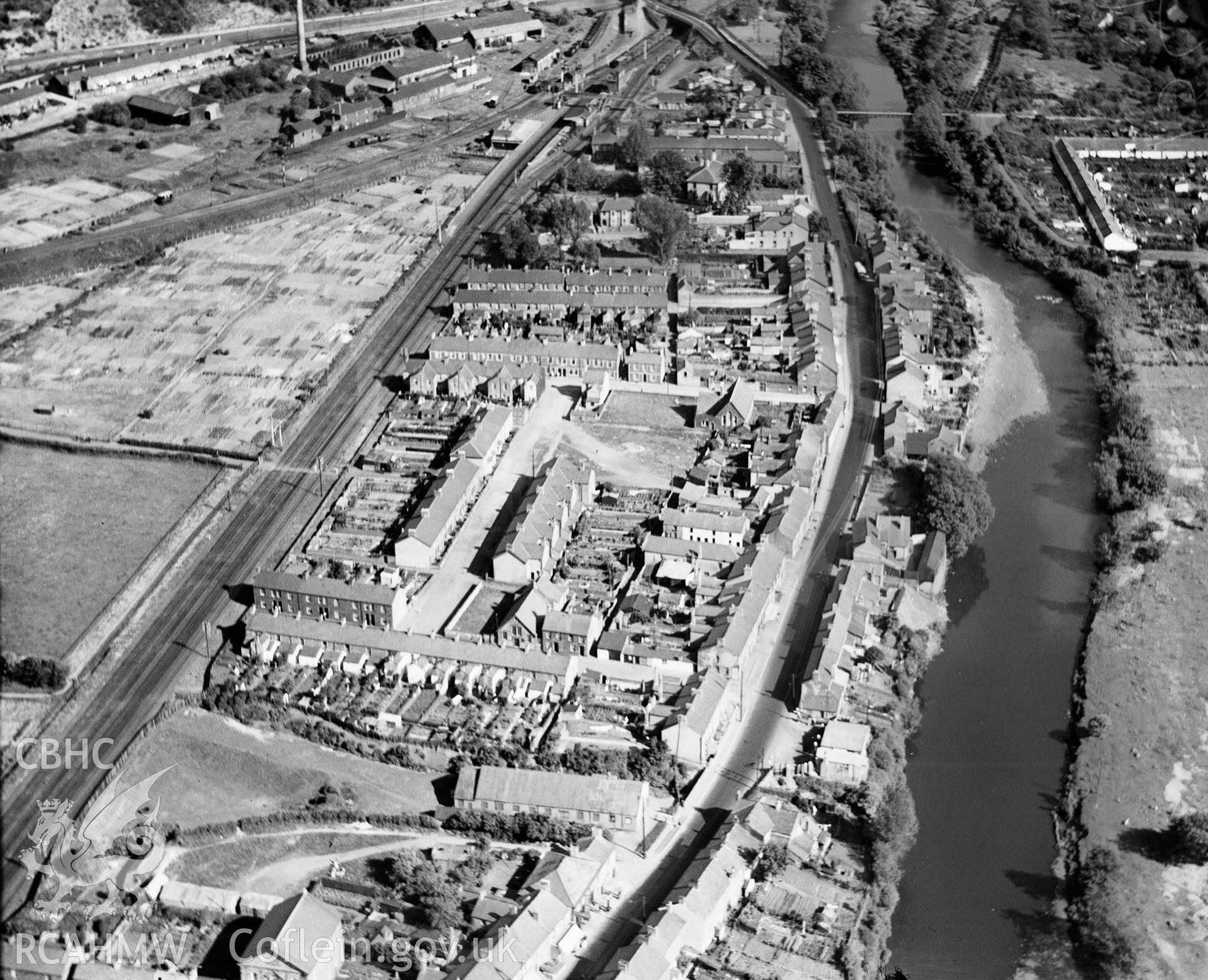 General view of Taffs Well showing housing, Taffs Well station, Glamorganshire Canal and Garth Ironworks, oblique aerial view. 5?x4? black and white glass plate negative.