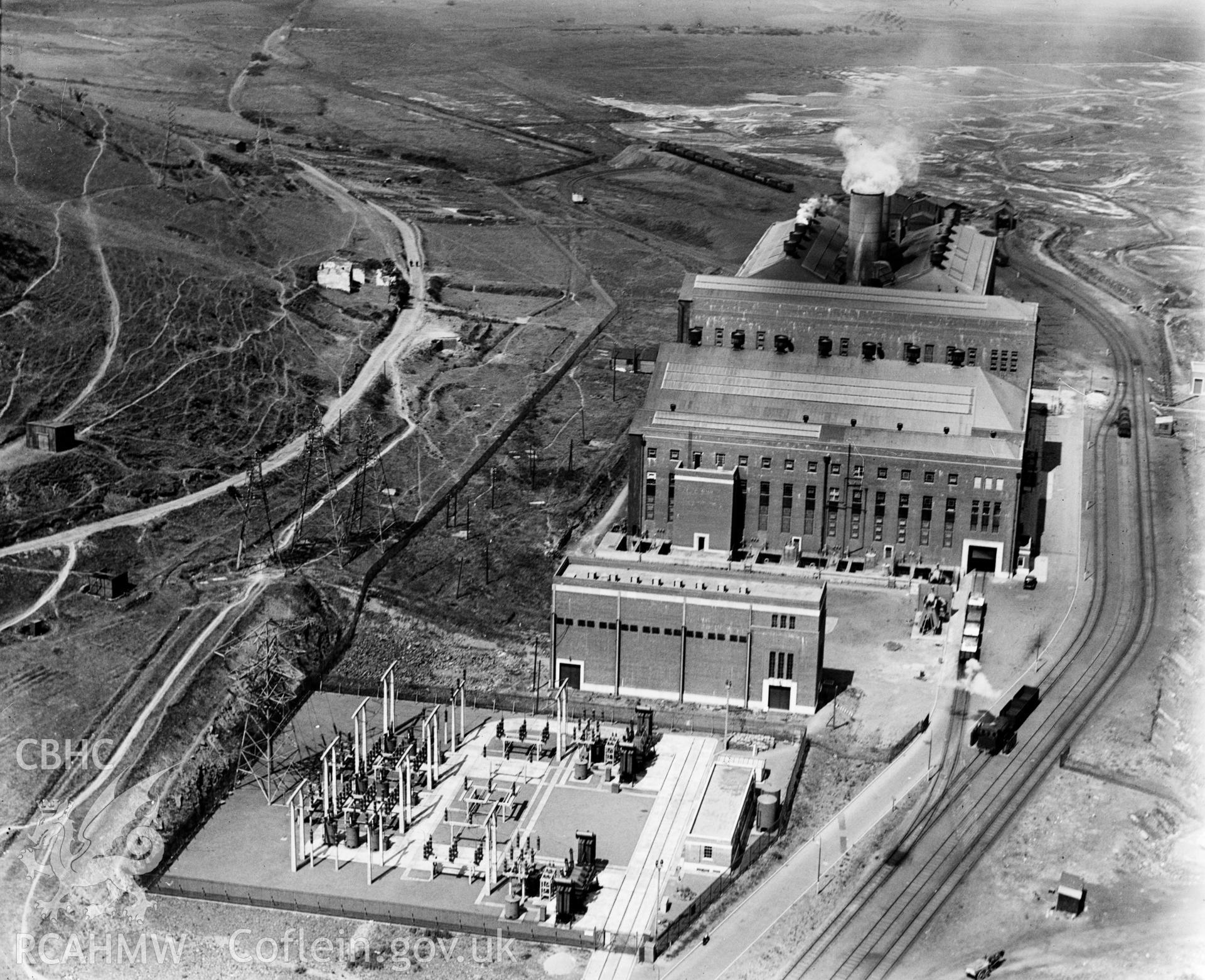View of Tir John power station, Swansea (A.R.P. County Borough of Swansea), oblique aerial view. 5?x4? black and white glass plate negative.