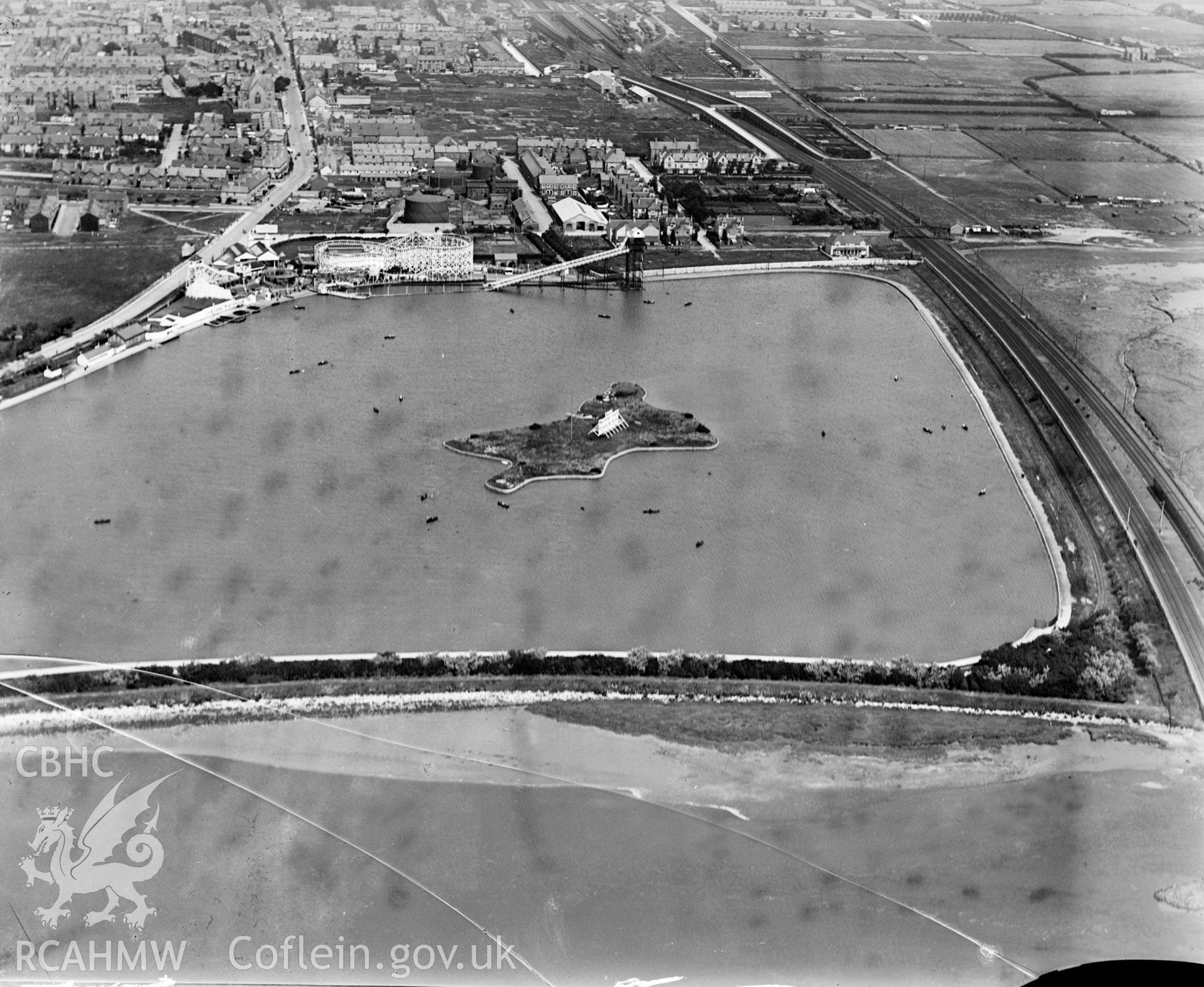 View of Rhyl showing the Marine Lake and Pleasure Park, oblique aerial view. 5?x4? black and white glass plate negative.