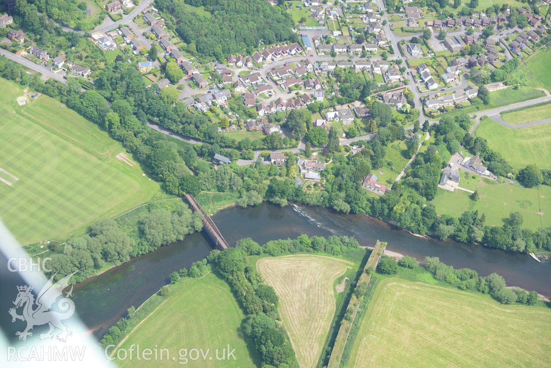 Duke of Beaufort Bridge and the Wye Viaduct on the Coleford, Monmouth, Usk and Pontypool Railway, Monmouth. Oblique aerial photograph taken during the Royal Commission's programme of archaeological aerial reconnaissance by Toby Driver on 11th June 2015.