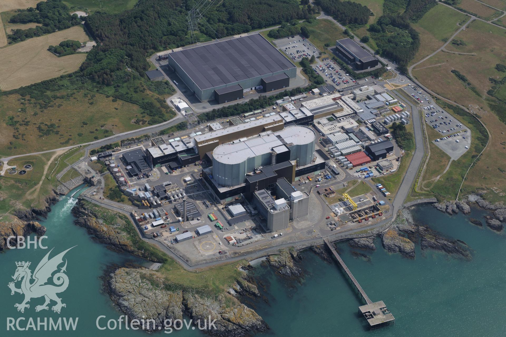 Wylfa Nuclear Power Station, near Cemmaes, on the north Anglesey coast. Oblique aerial photograph taken during the Royal Commission?s programme of archaeological aerial reconnaissance by Toby Driver on 12th July 2013.