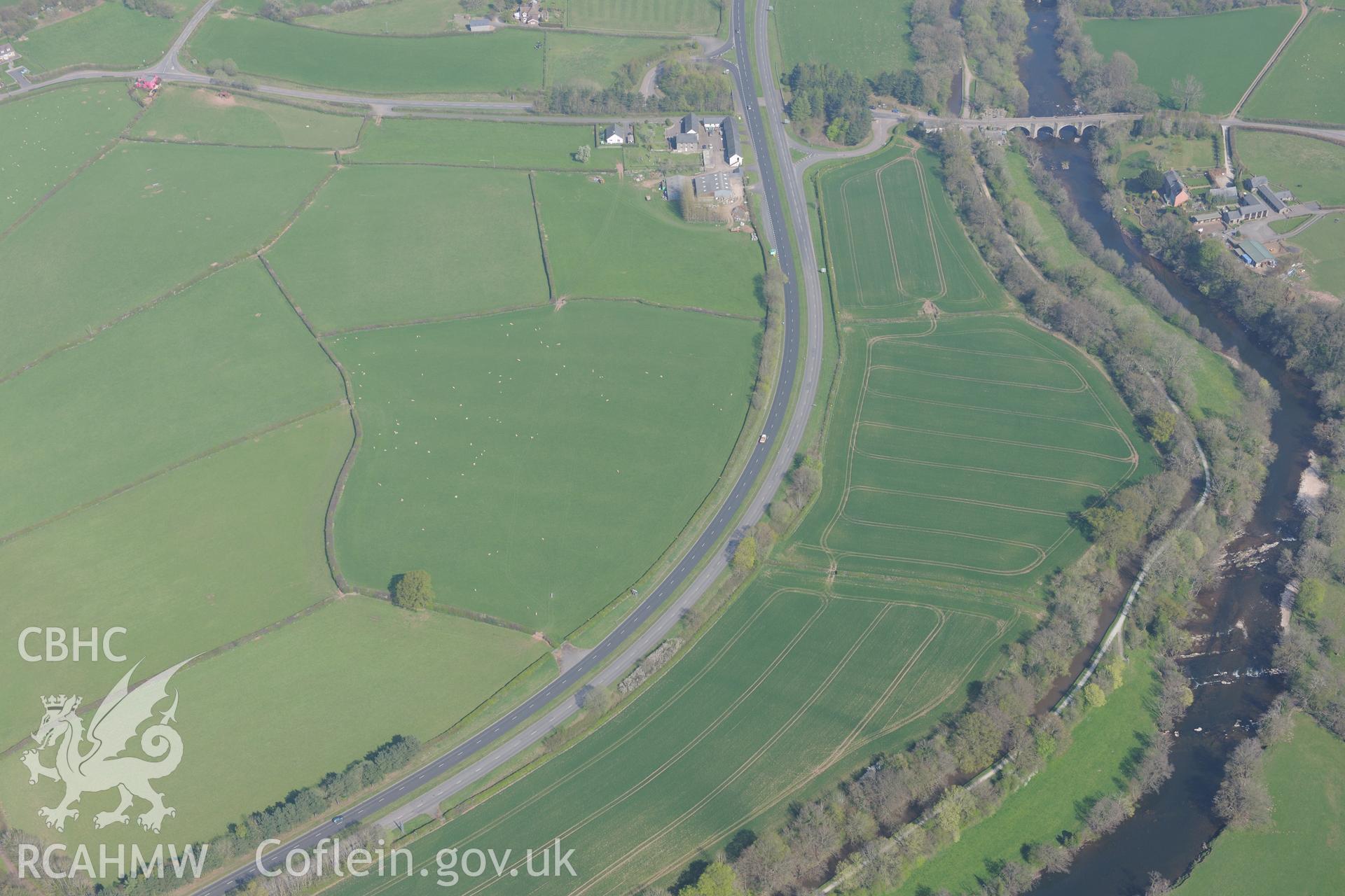 Cefn Brynich Farm, Cefn-Brynich Roman Fort and Lock Road Bridge. Oblique aerial photograph taken during the Royal Commission's programme of archaeological aerial reconnaissance by Toby Driver on 21st April 2015