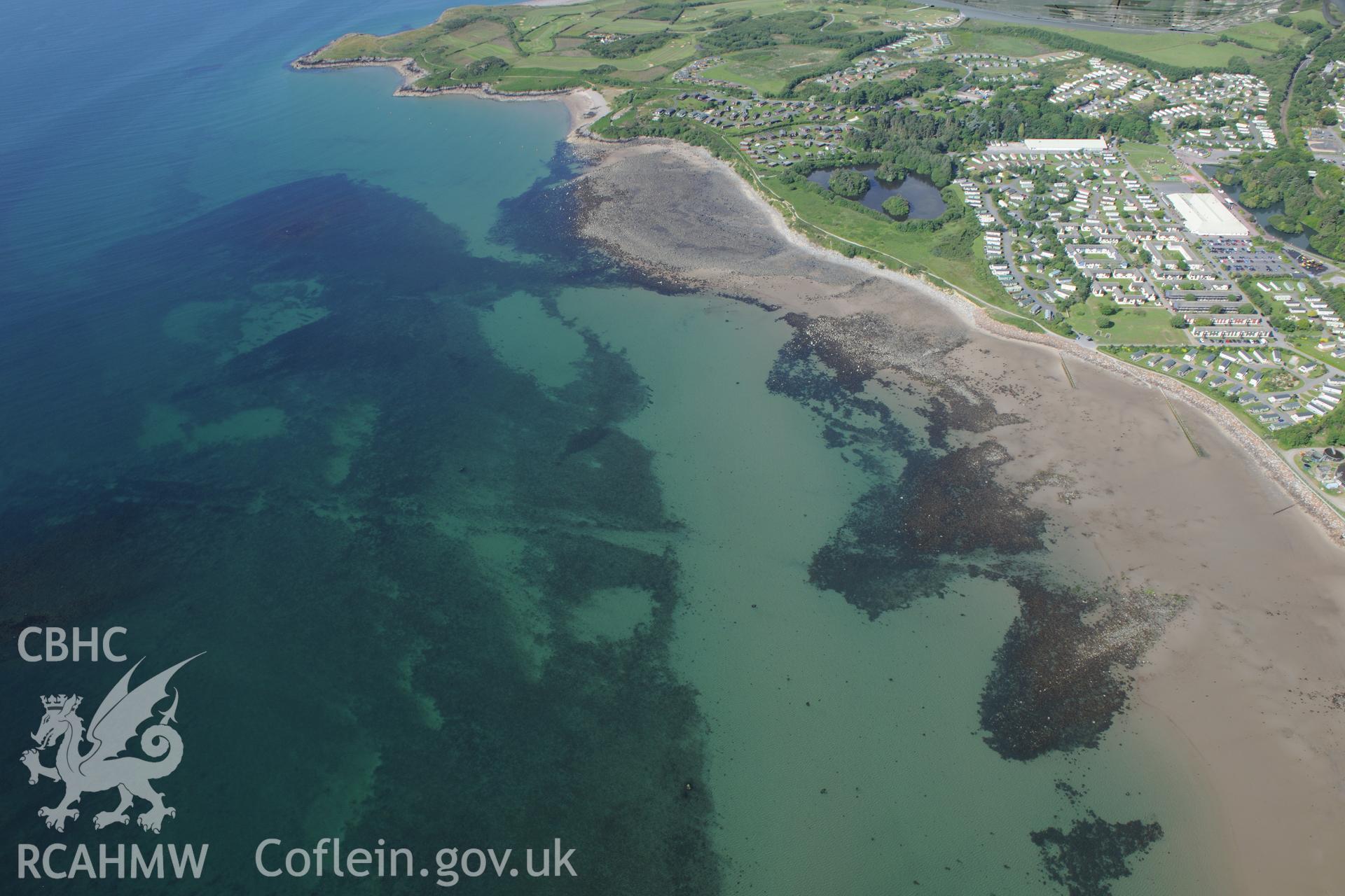 Hafan y Mor Holiday Park and Cerrig y Barcdy fish trap, Pwllheli. Oblique aerial photograph taken during the Royal Commission's programme of archaeological aerial reconnaissance by Toby Driver on 23rd June 2015.