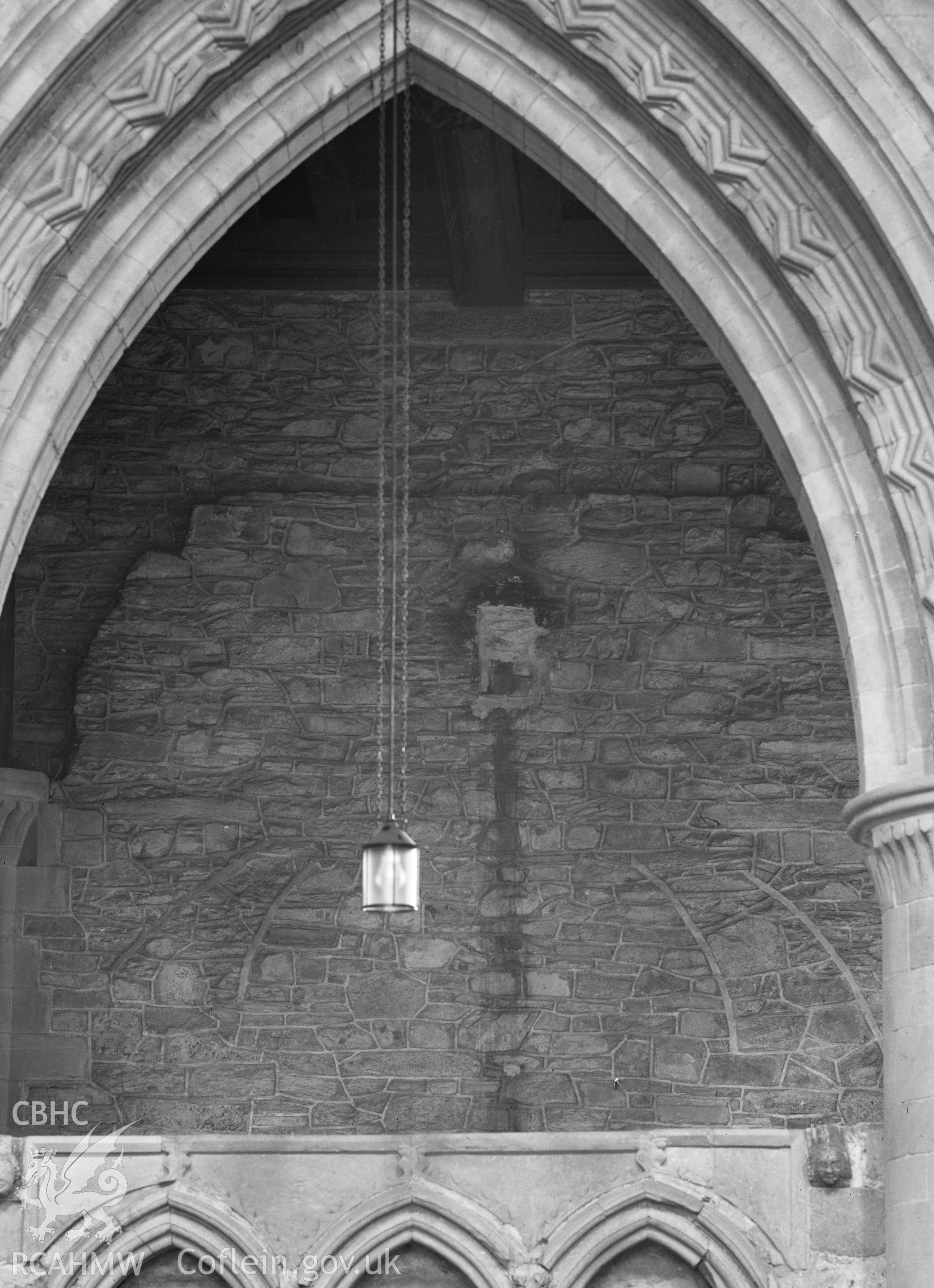 Digital copy of a black and white nitrate negative showing interior view of archway at St. David's Cathedral, taken by E.W. Lovegrove, July 1936.