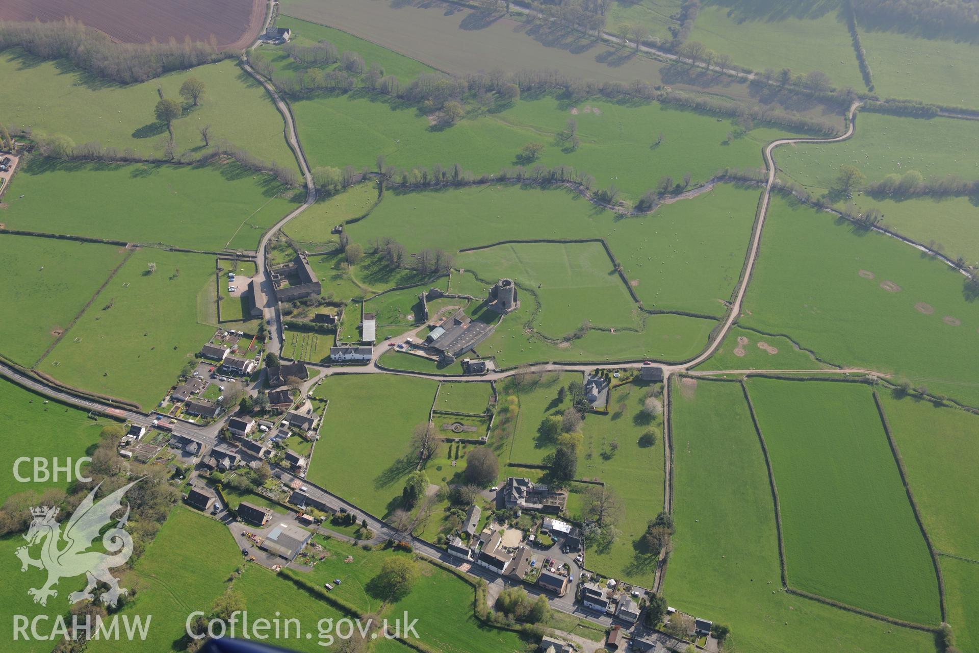 Tretower Village, Castle, Court, Cottage, Barn and Leat, Ty Llys Farm and St John's Church. Oblique aerial photograph taken during the Royal Commission's programme of archaeological aerial reconnaissance by Toby Driver on 21st April 2015